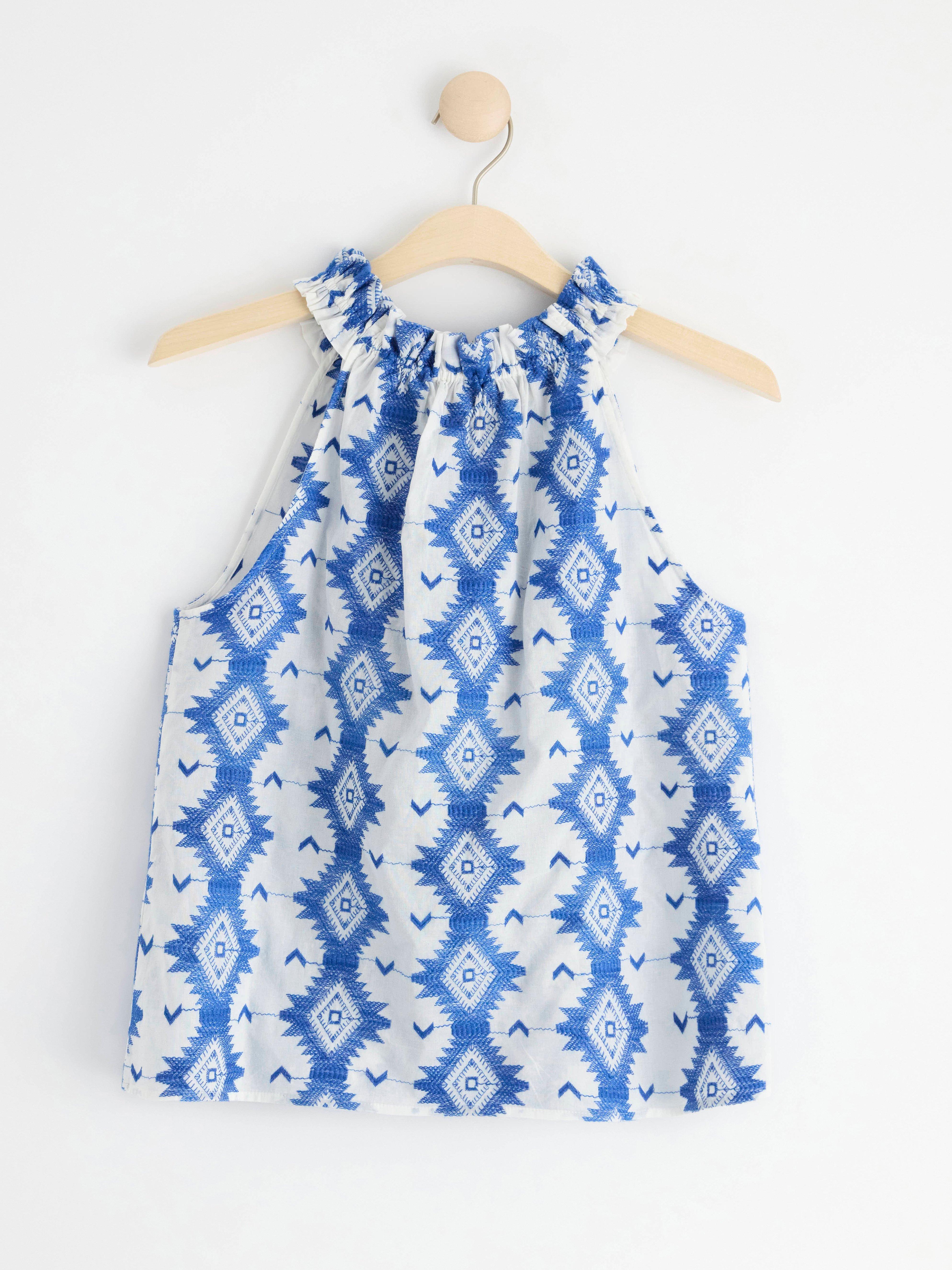 Sleeveless blouse with embroidery Off White