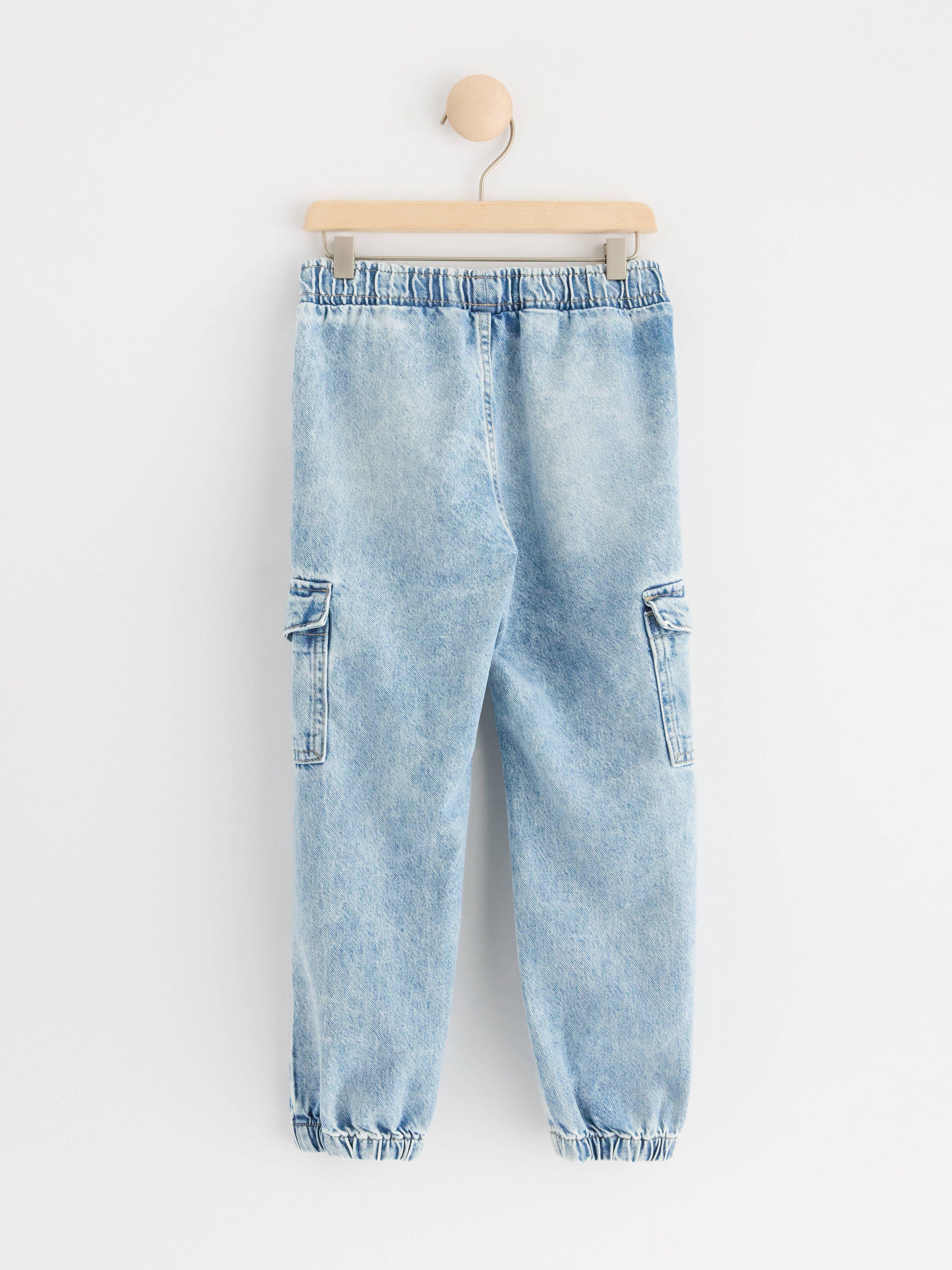 Trousers with cargo pockets Washed denim