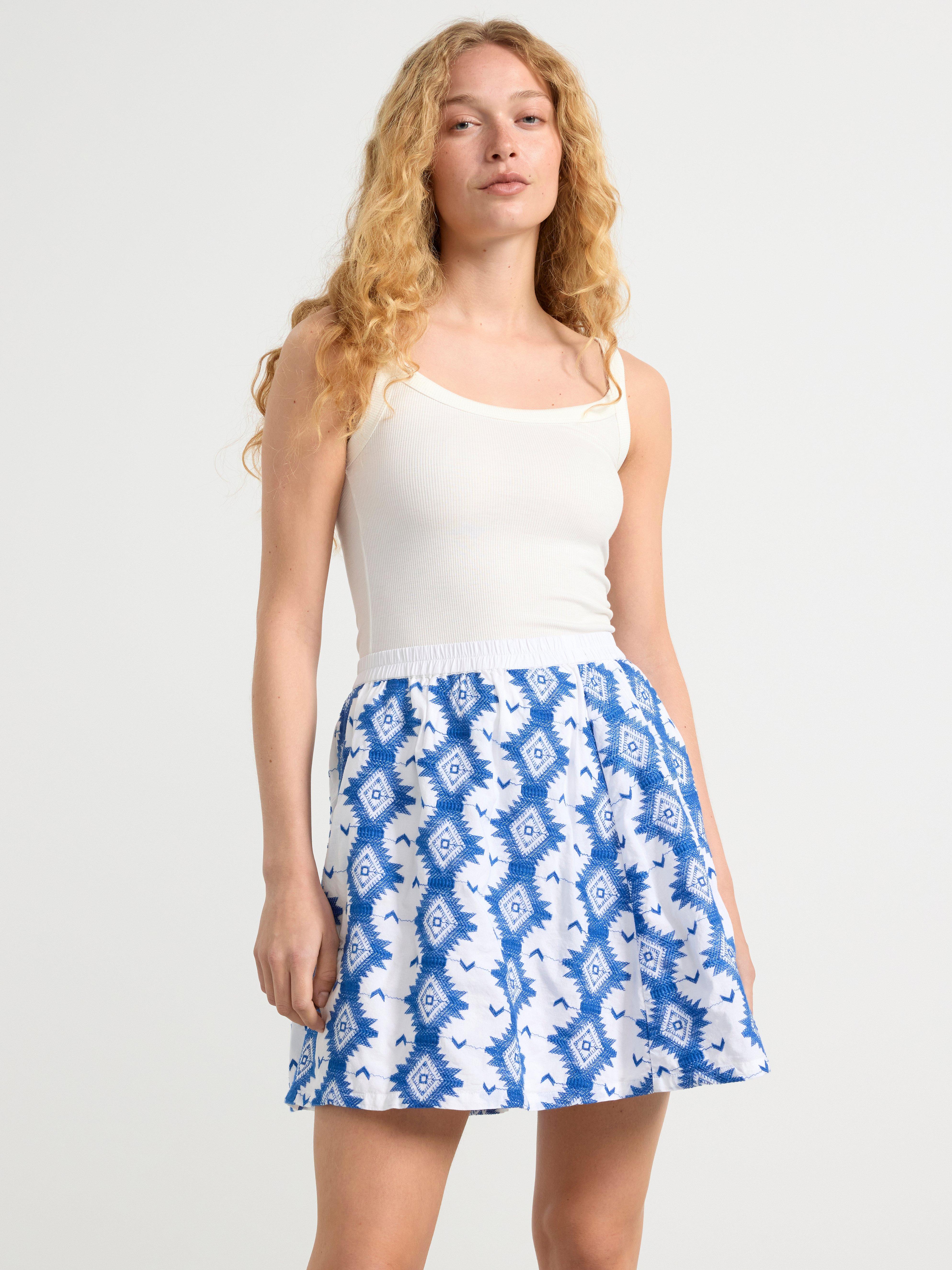 Skirt with embroidered pattern Off White