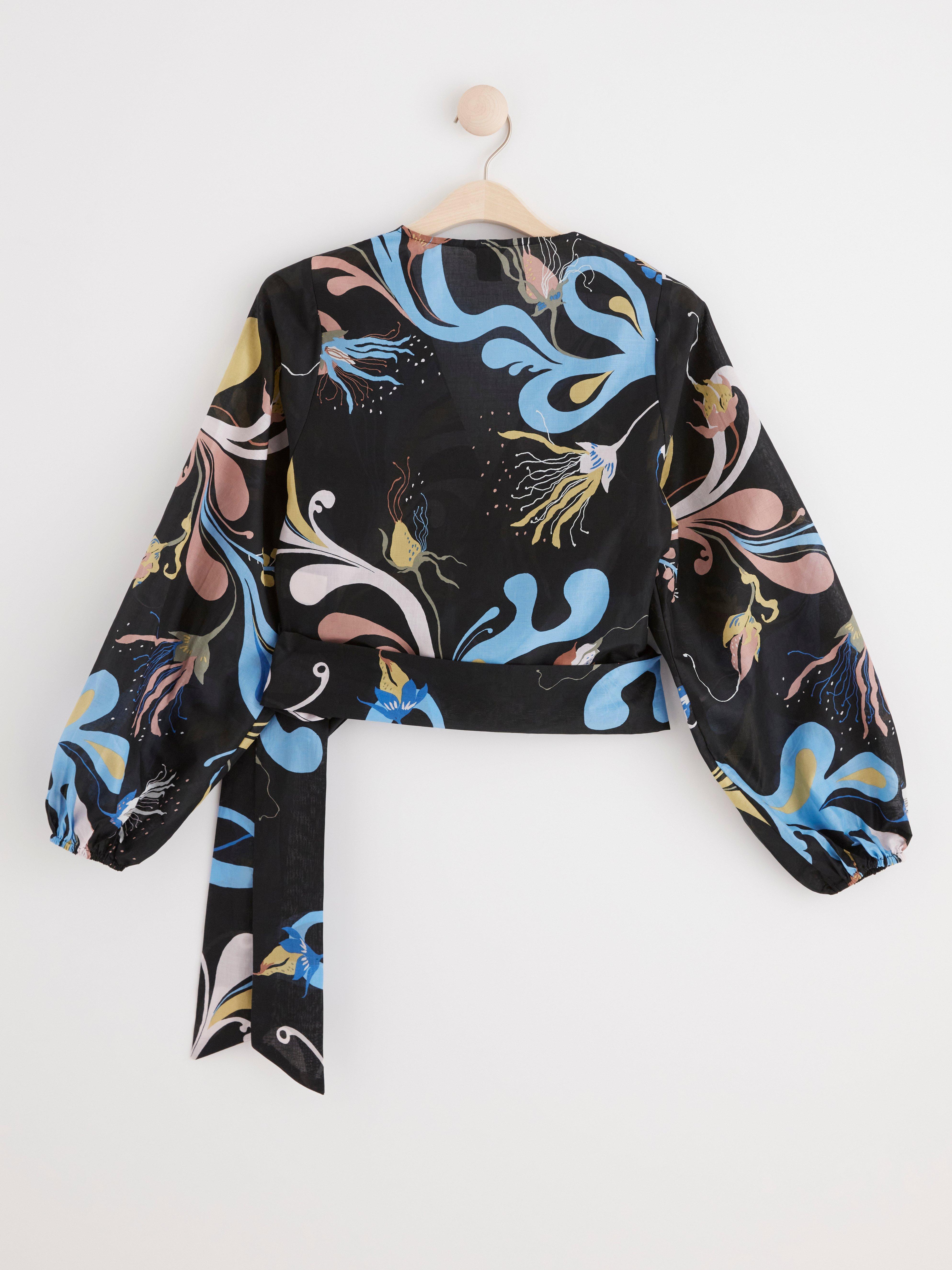 Patterned puff sleeve wrap blouse Black