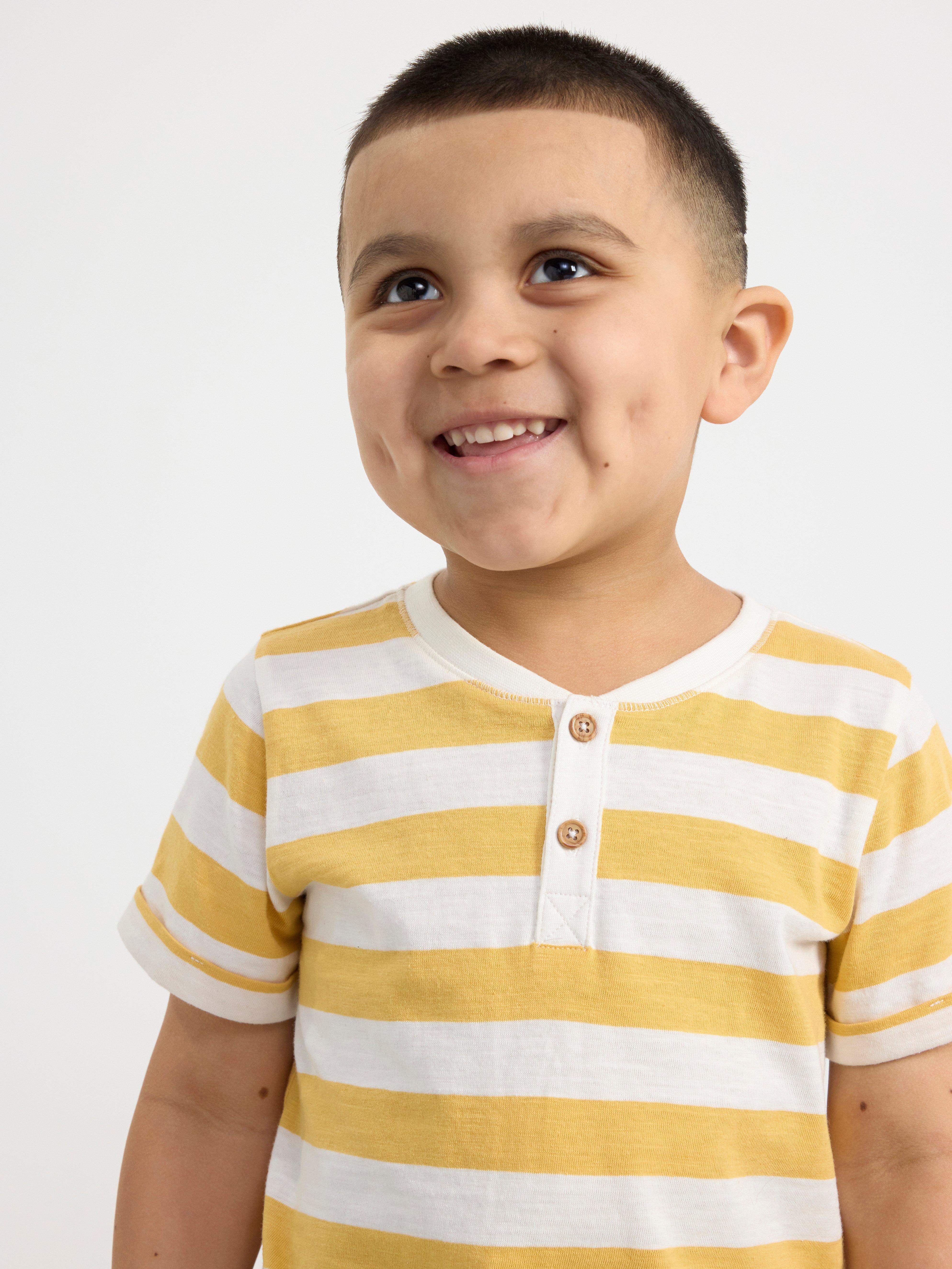 Short sleeve top with buttons Light Dusty Yellow