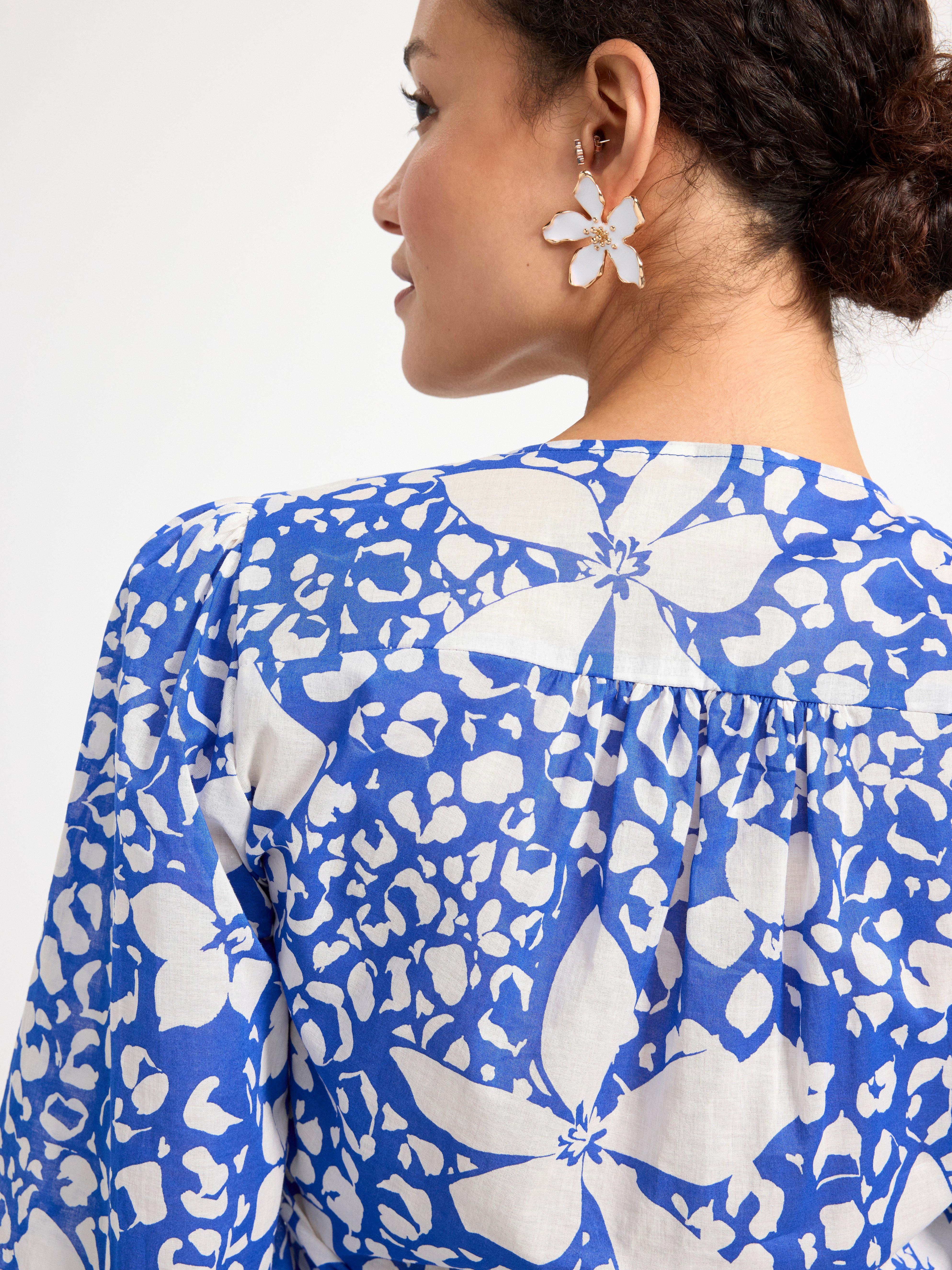 Patterned puff sleeve wrap blouse blue