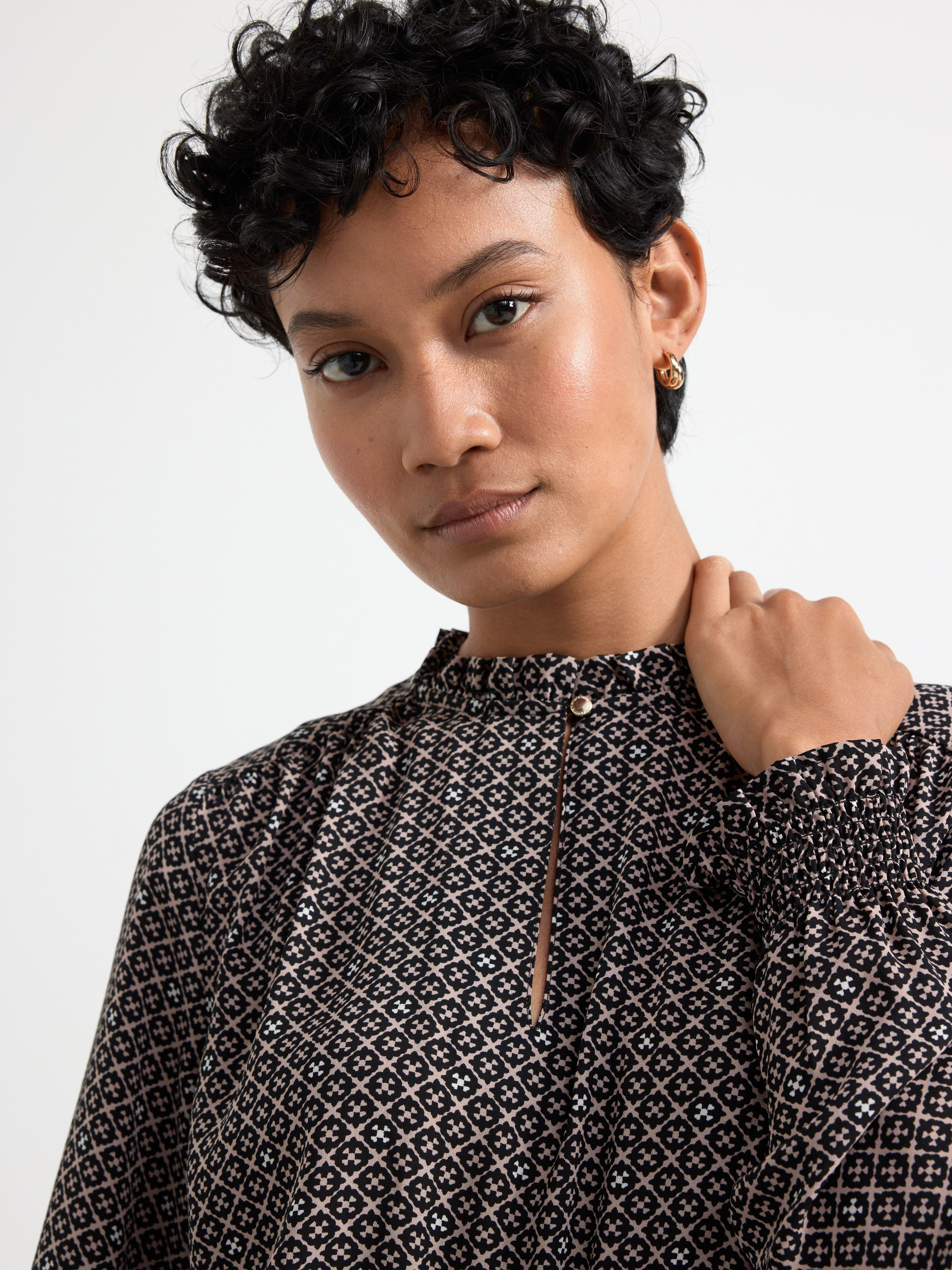 Patterned long sleeve dress with flounces Black