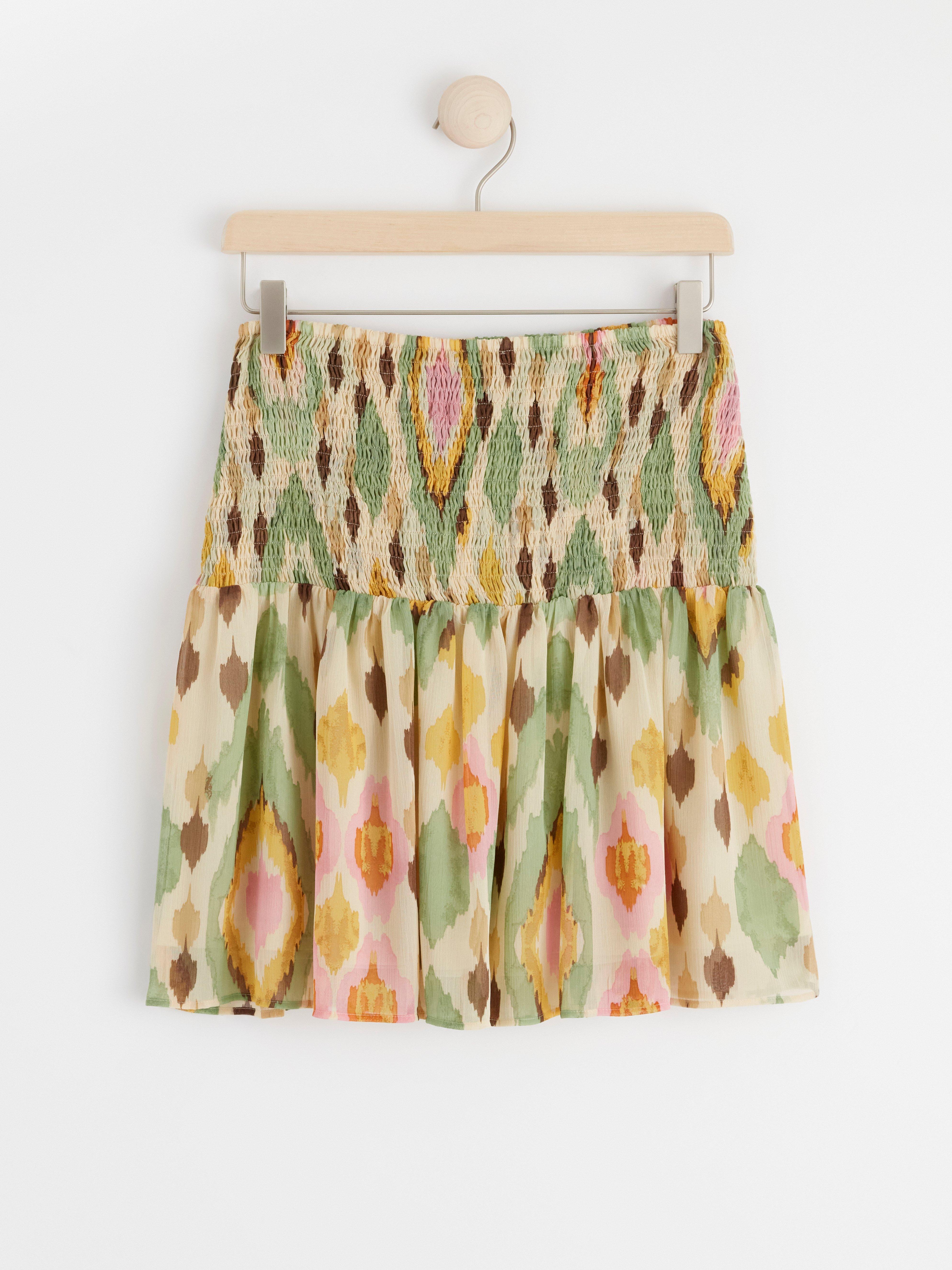 Mini chiffon skirt with smock Light beige
