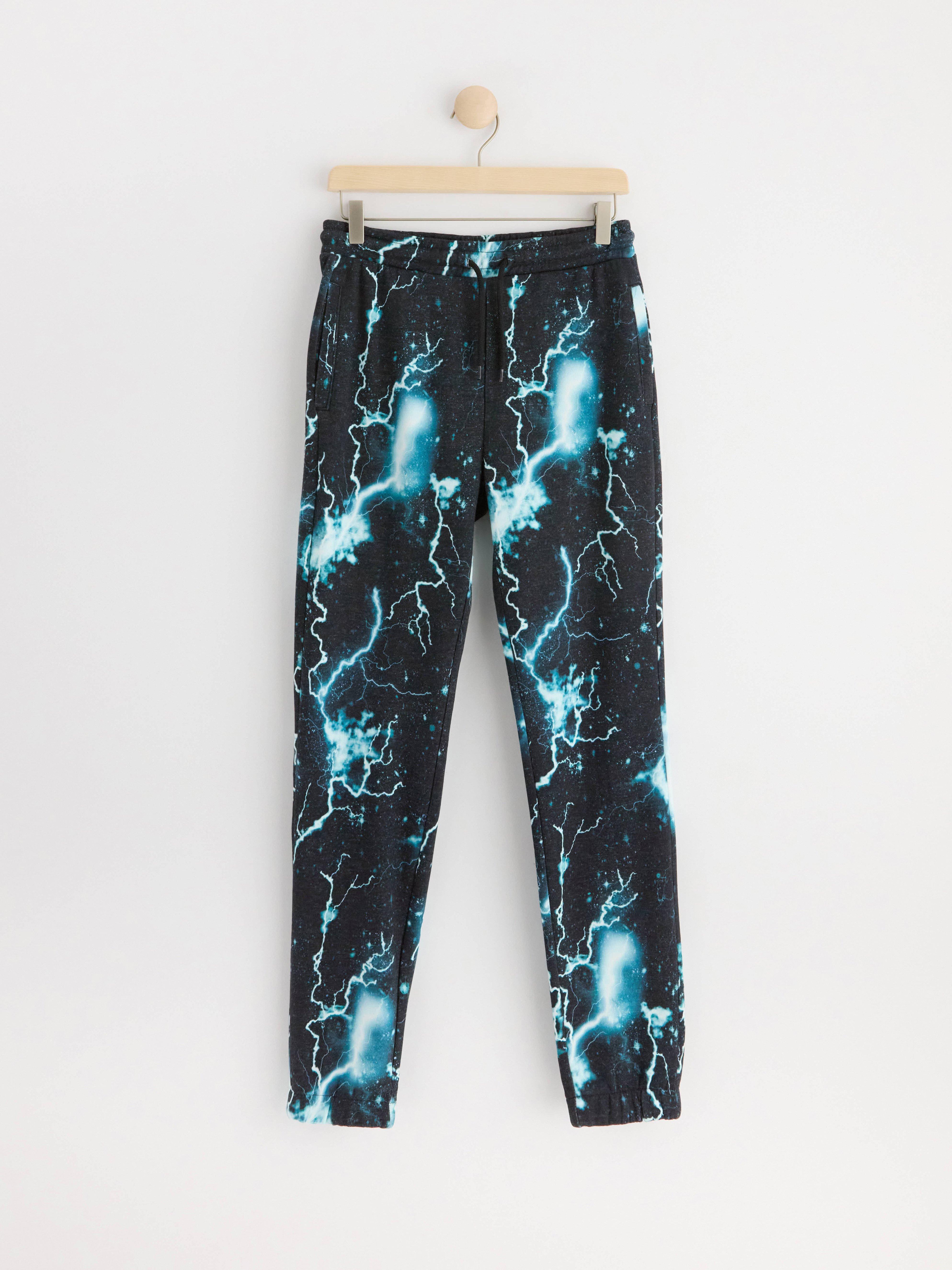 Joggers with brushed inside and allover pattern Dusty turqouise