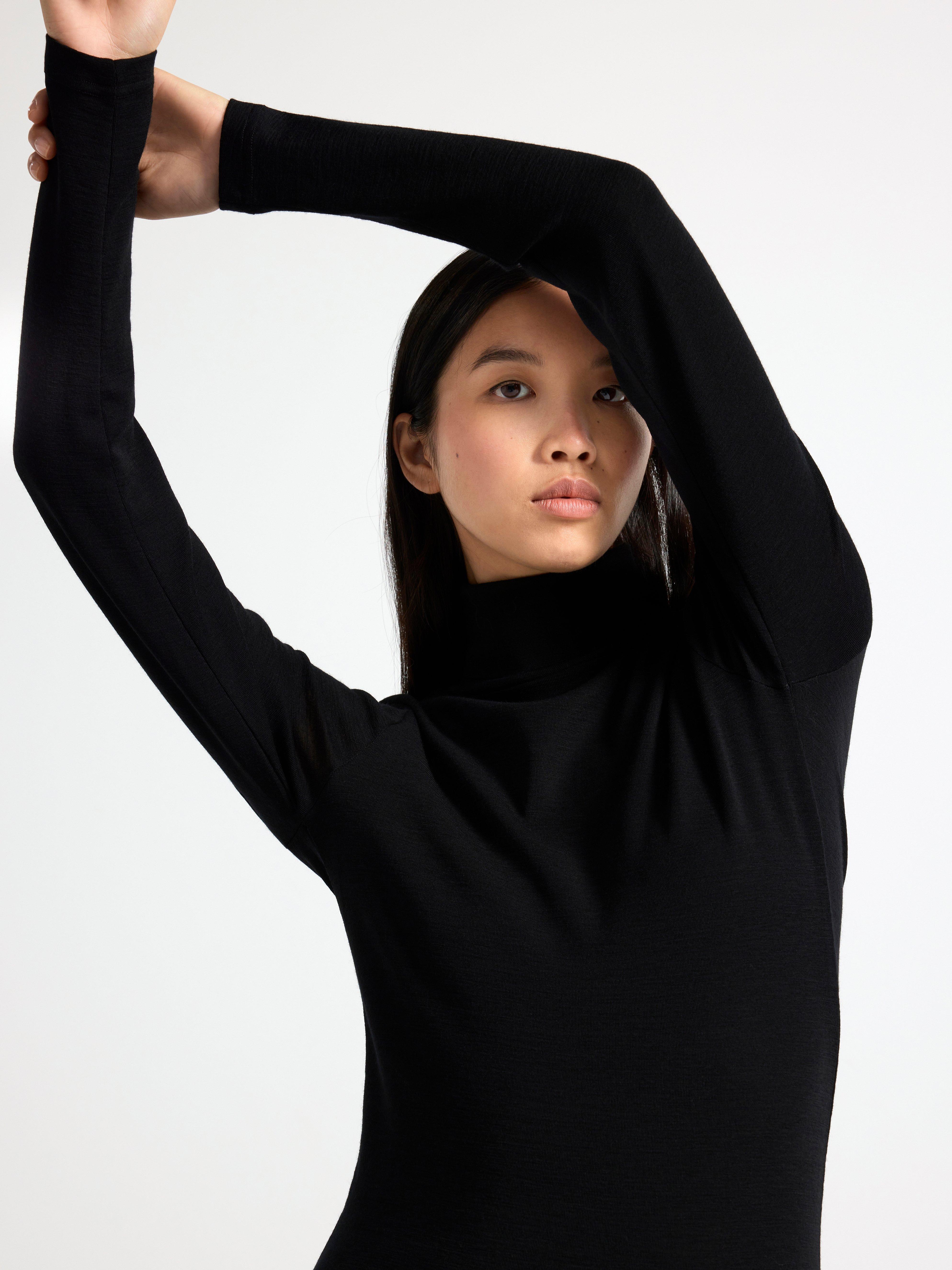 Roll neck top in merino wool Black