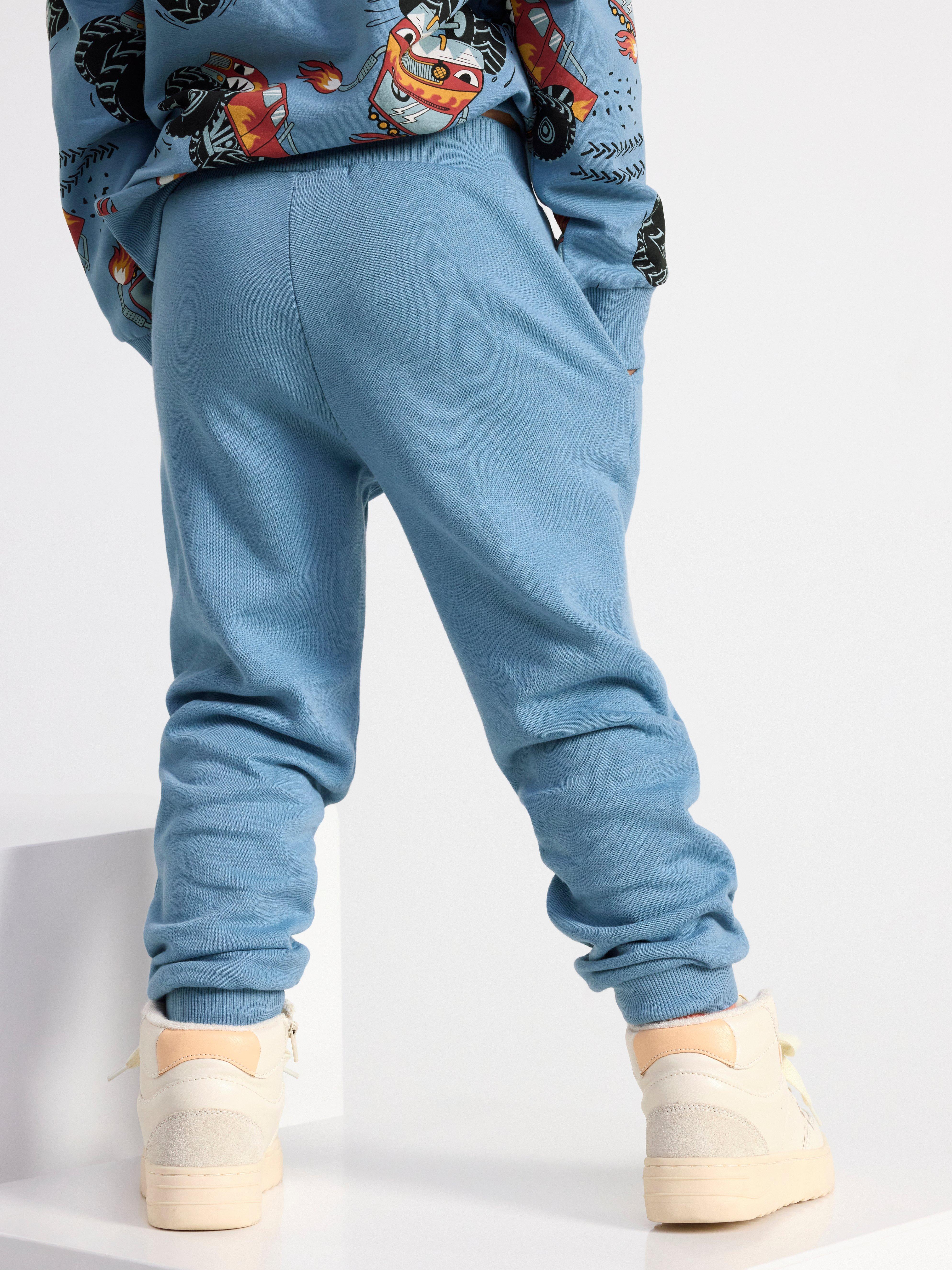 Joggers with monstertruck Light Dusty Blue