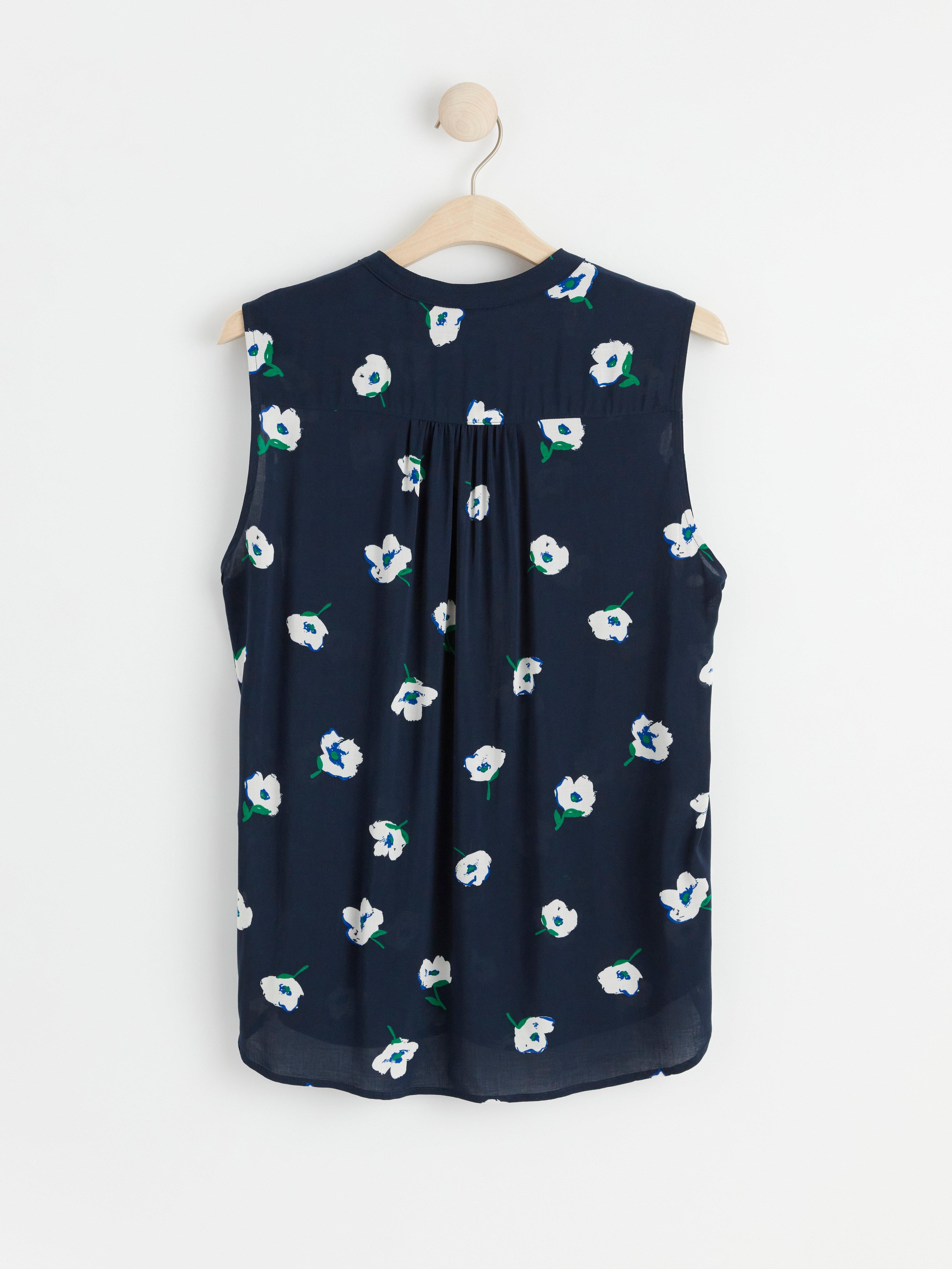 Sleeveless blouse with pattern Navy