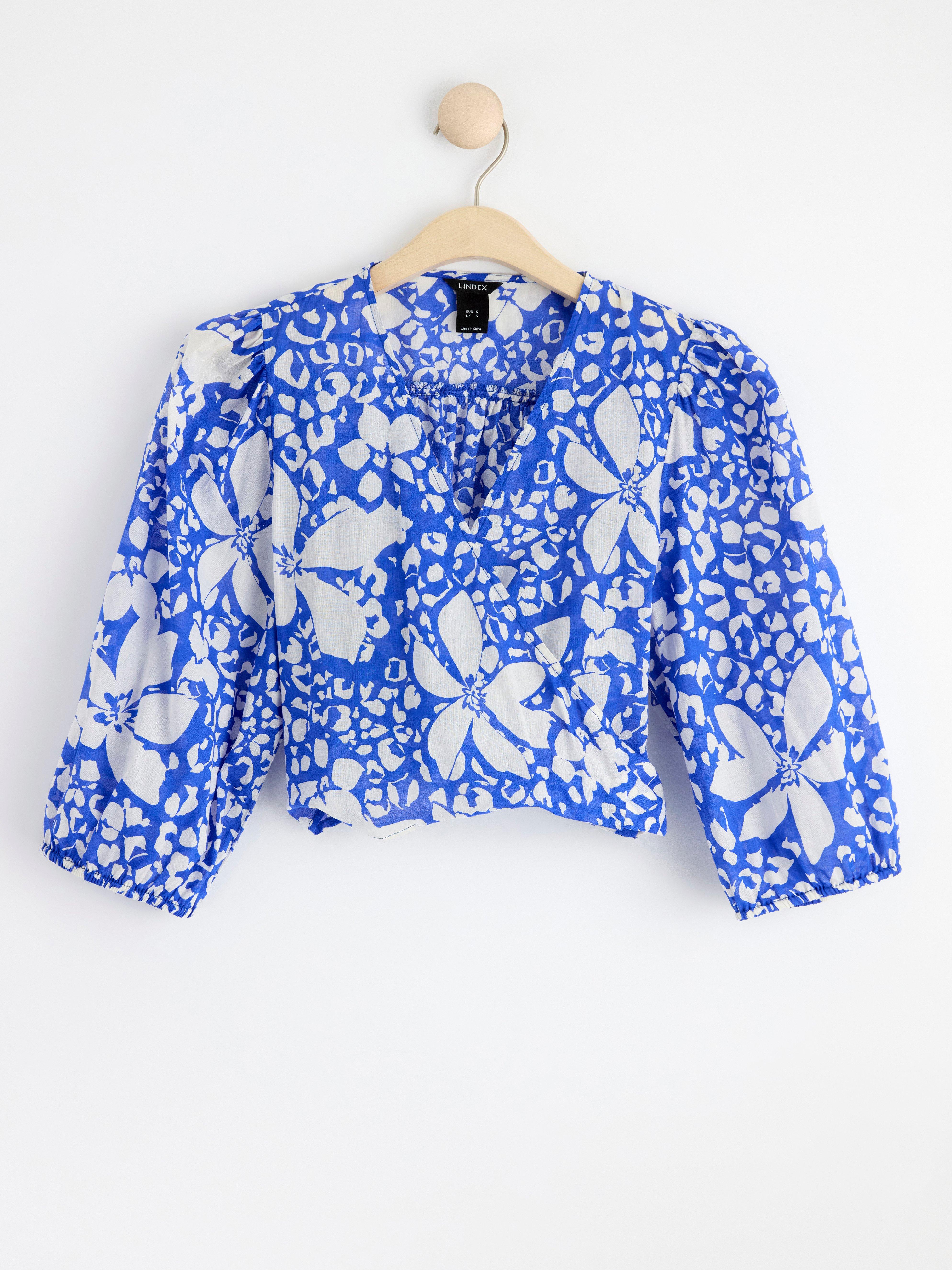 Patterned puff sleeve wrap blouse blue