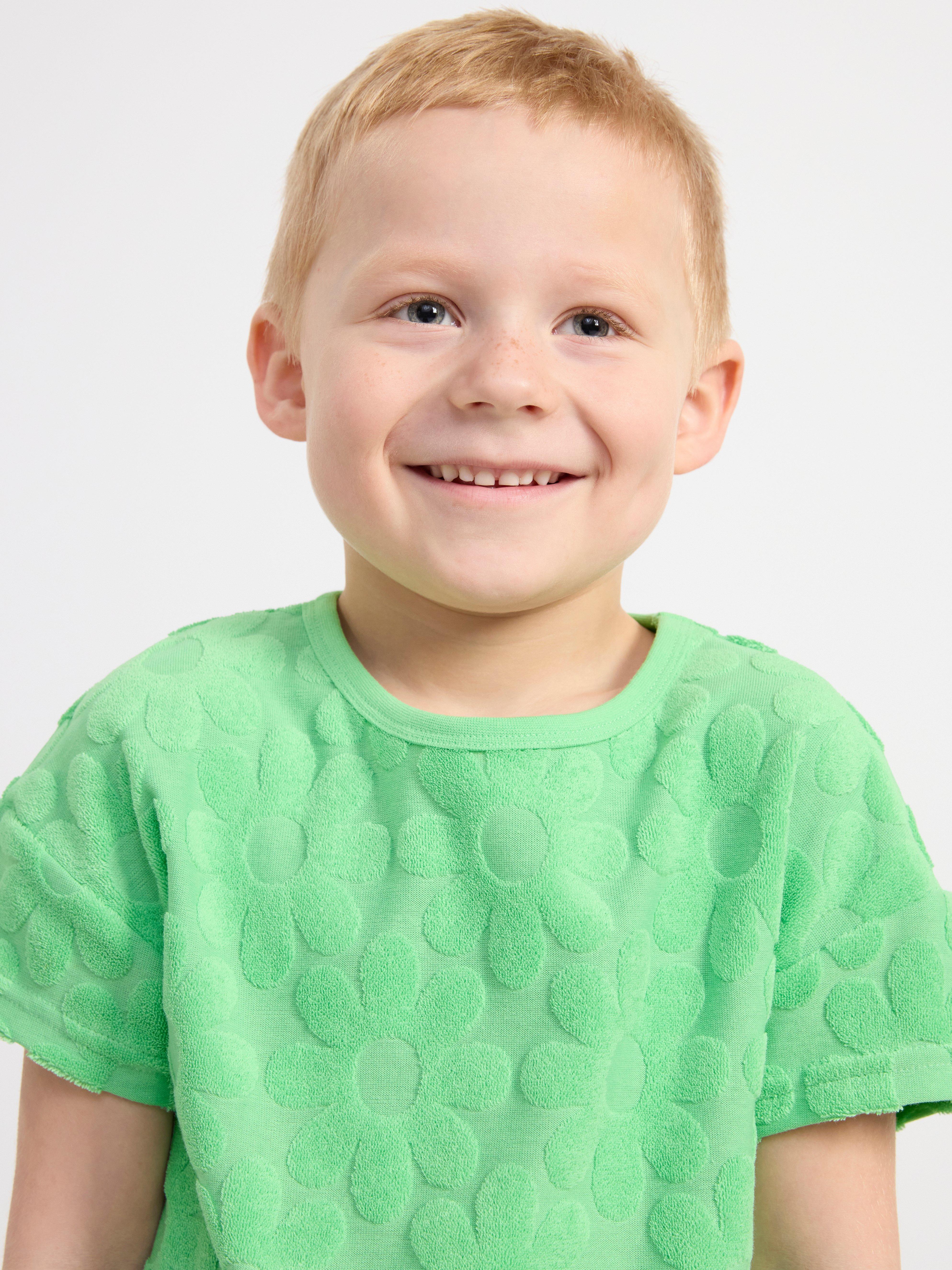 Short sleeve terry top with flower pattern Green