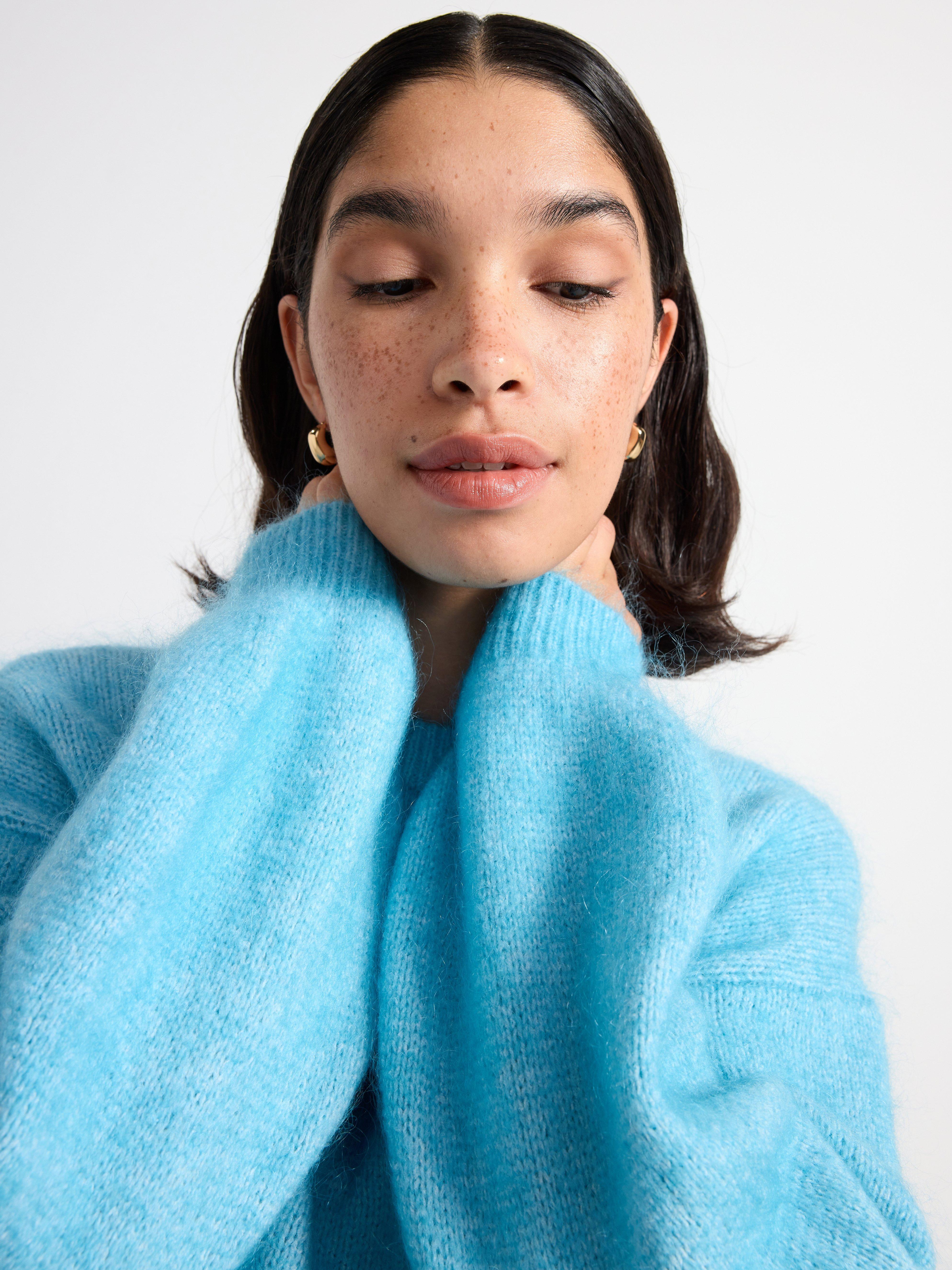 Knitted jumper in mohair blend turqoise