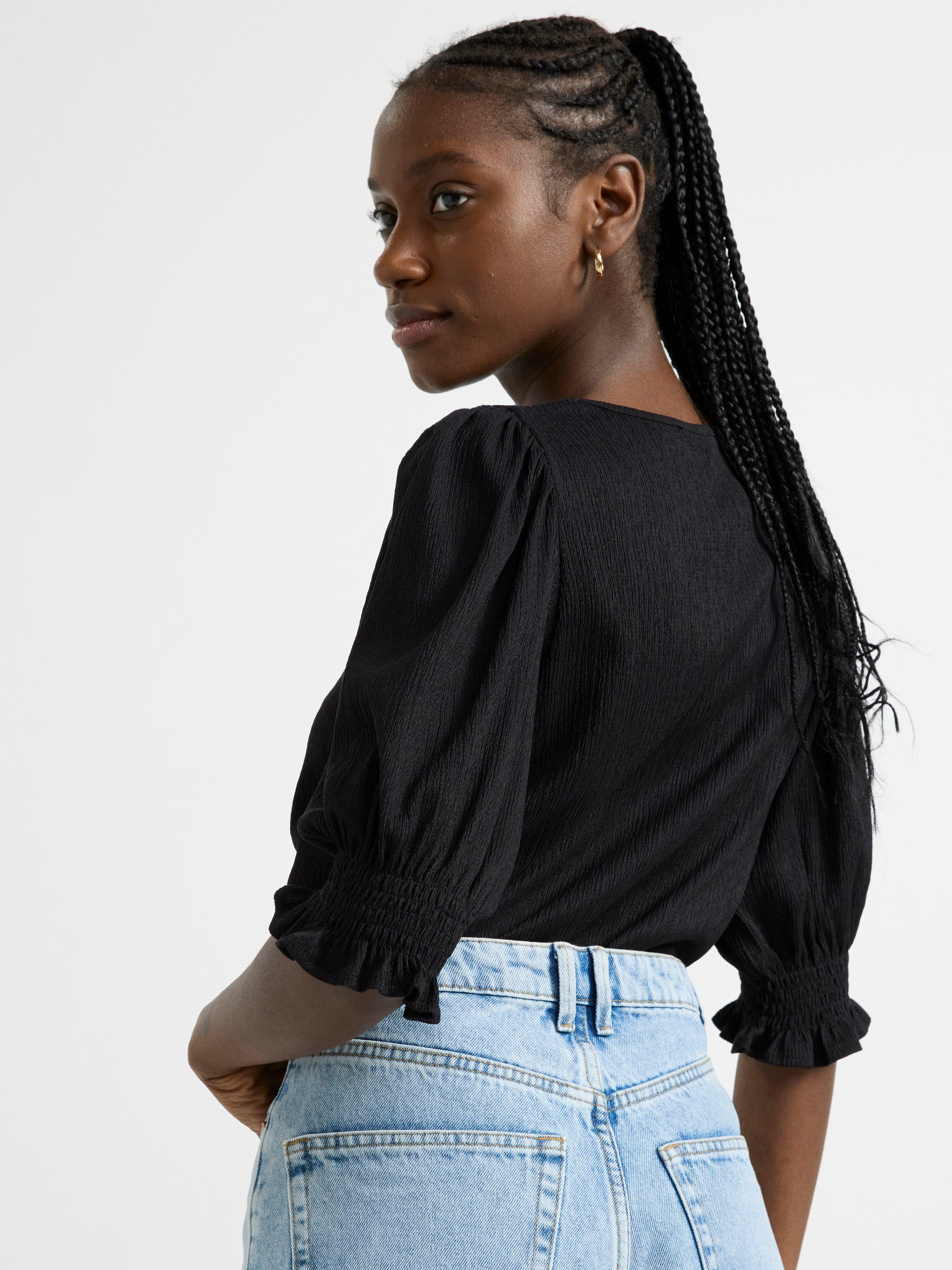 Textured puff sleeve top Black