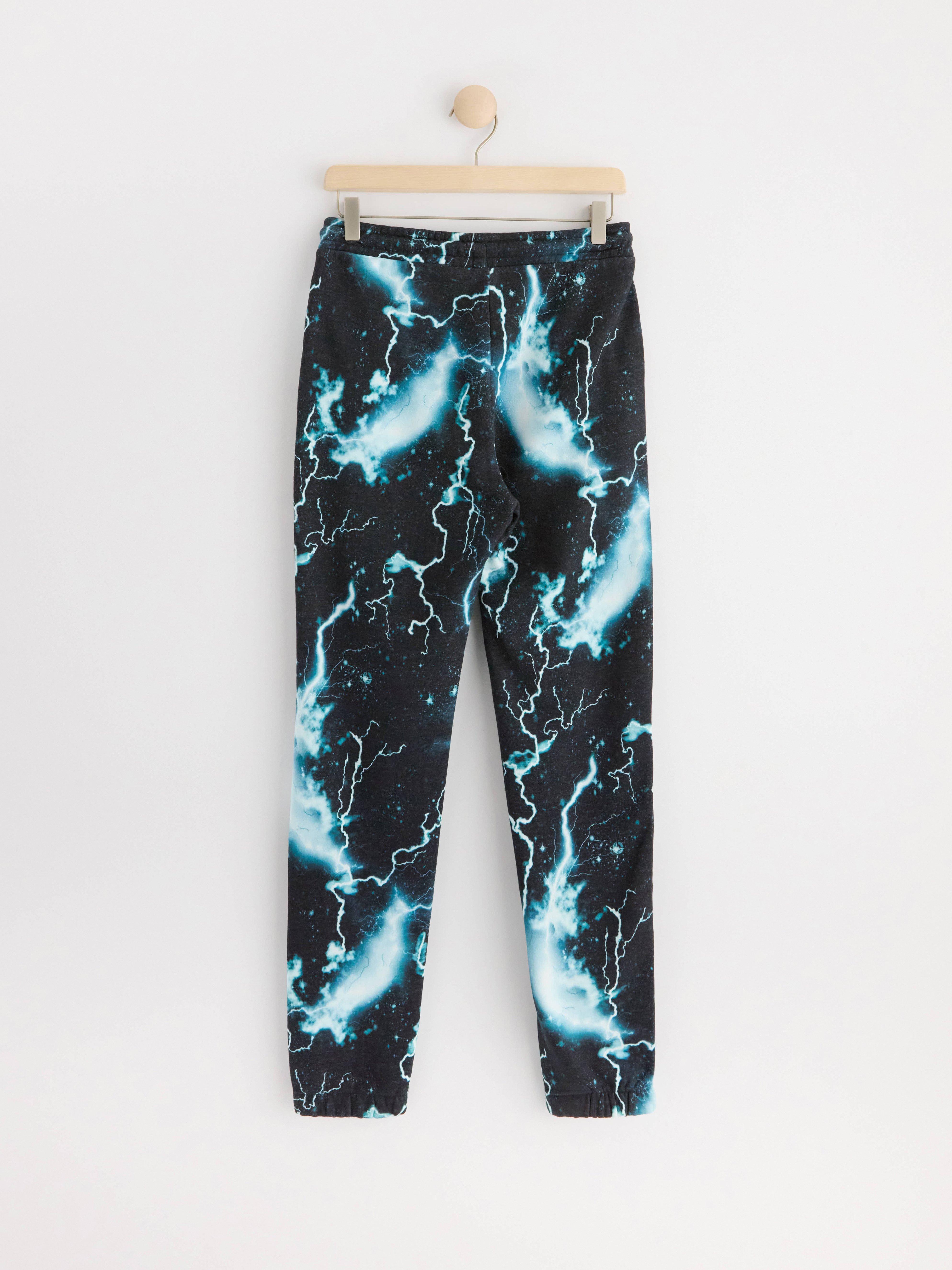 Joggers with brushed inside and allover pattern Dusty turqouise