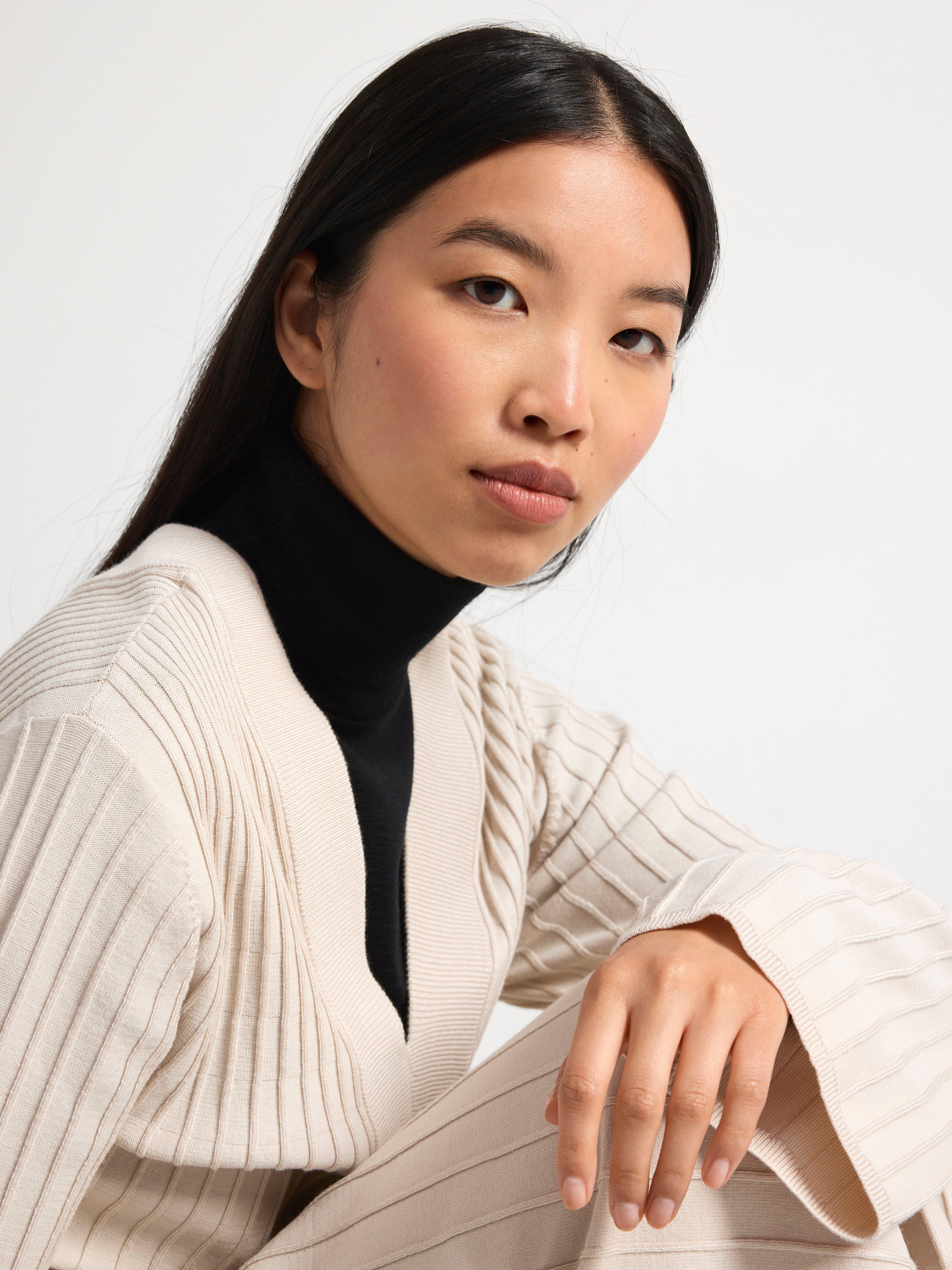 Roll neck top in merino wool Black