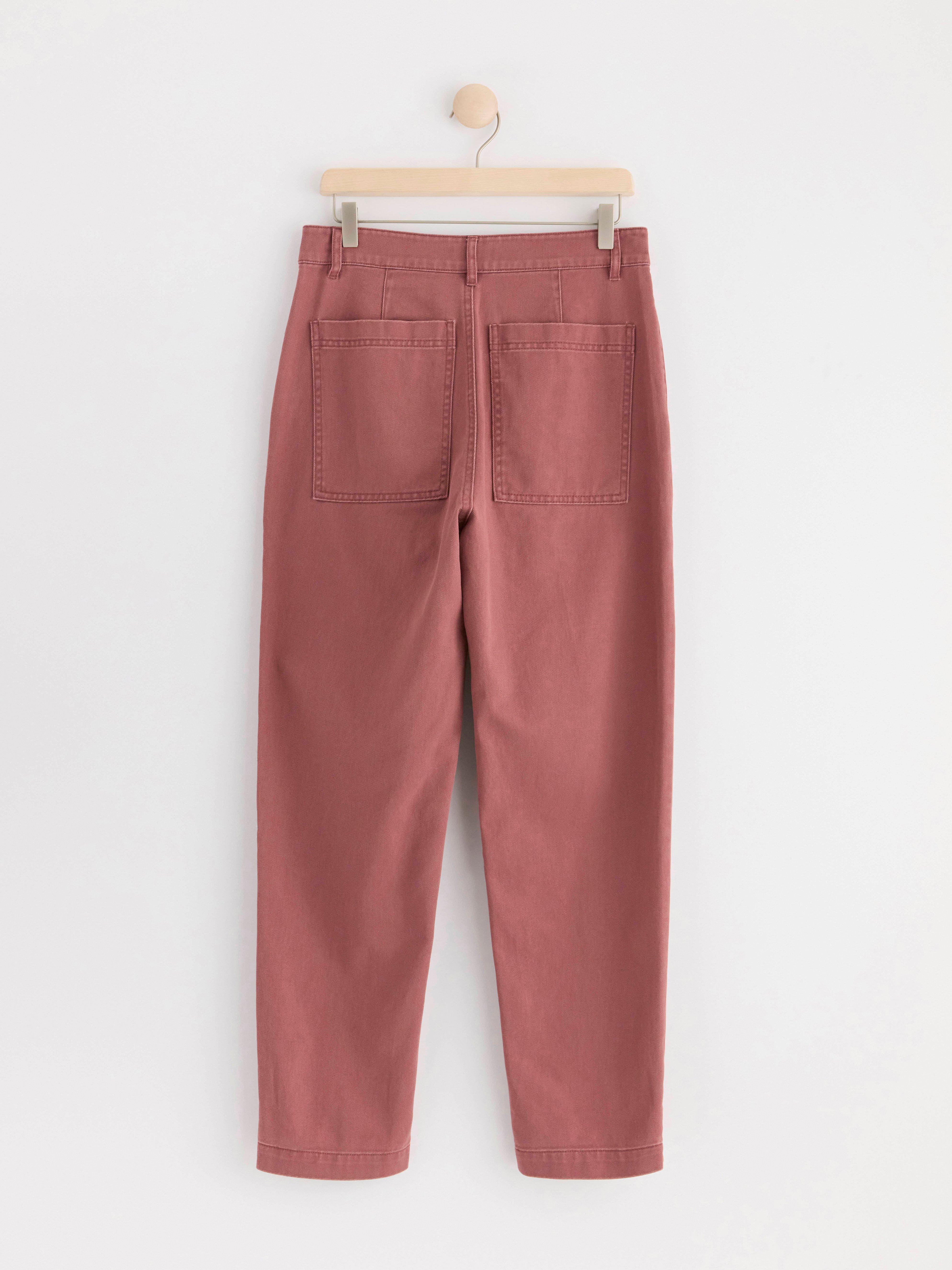 Tapered trousers with large pockets pink