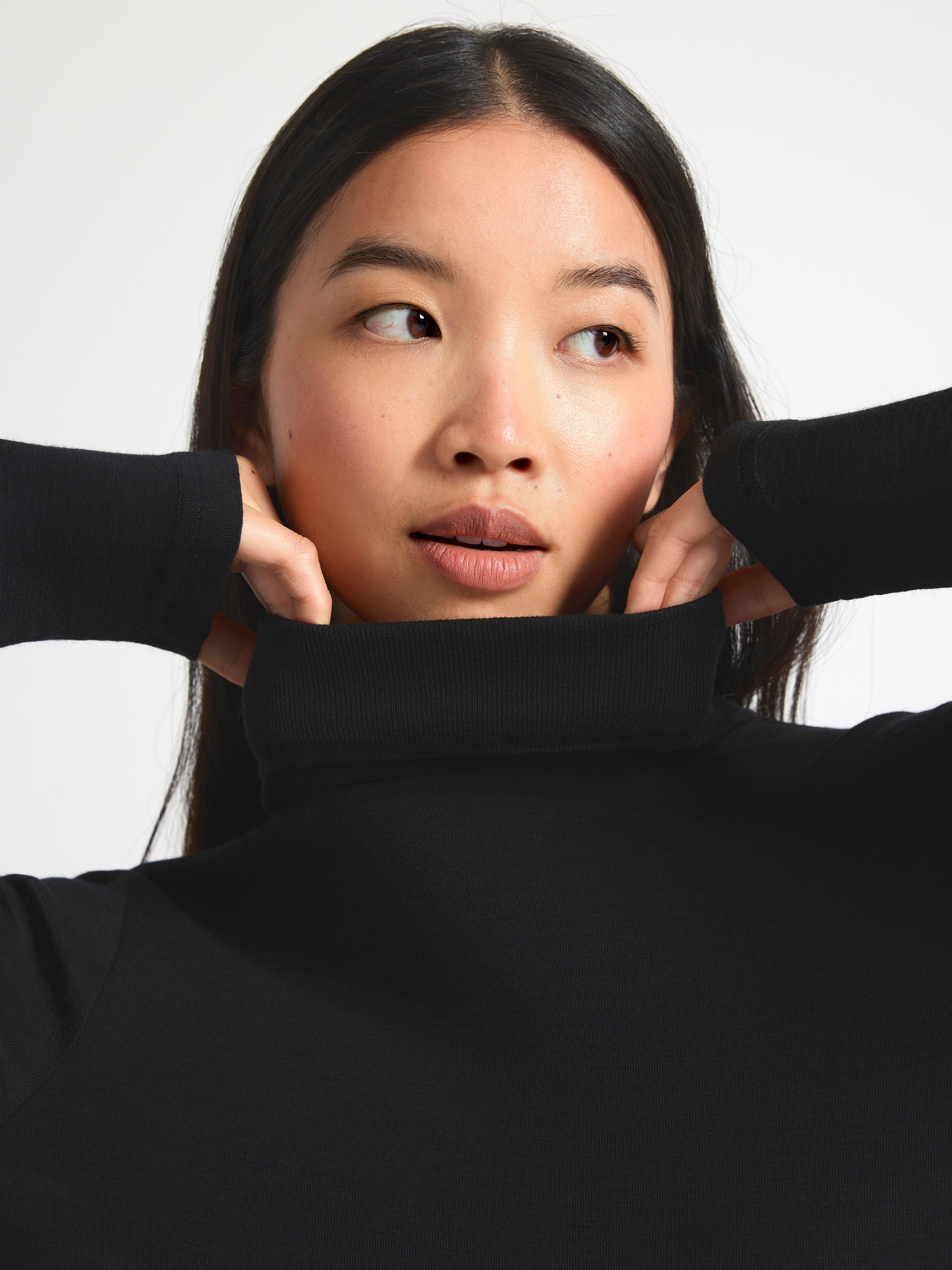 Roll neck top in merino wool Black