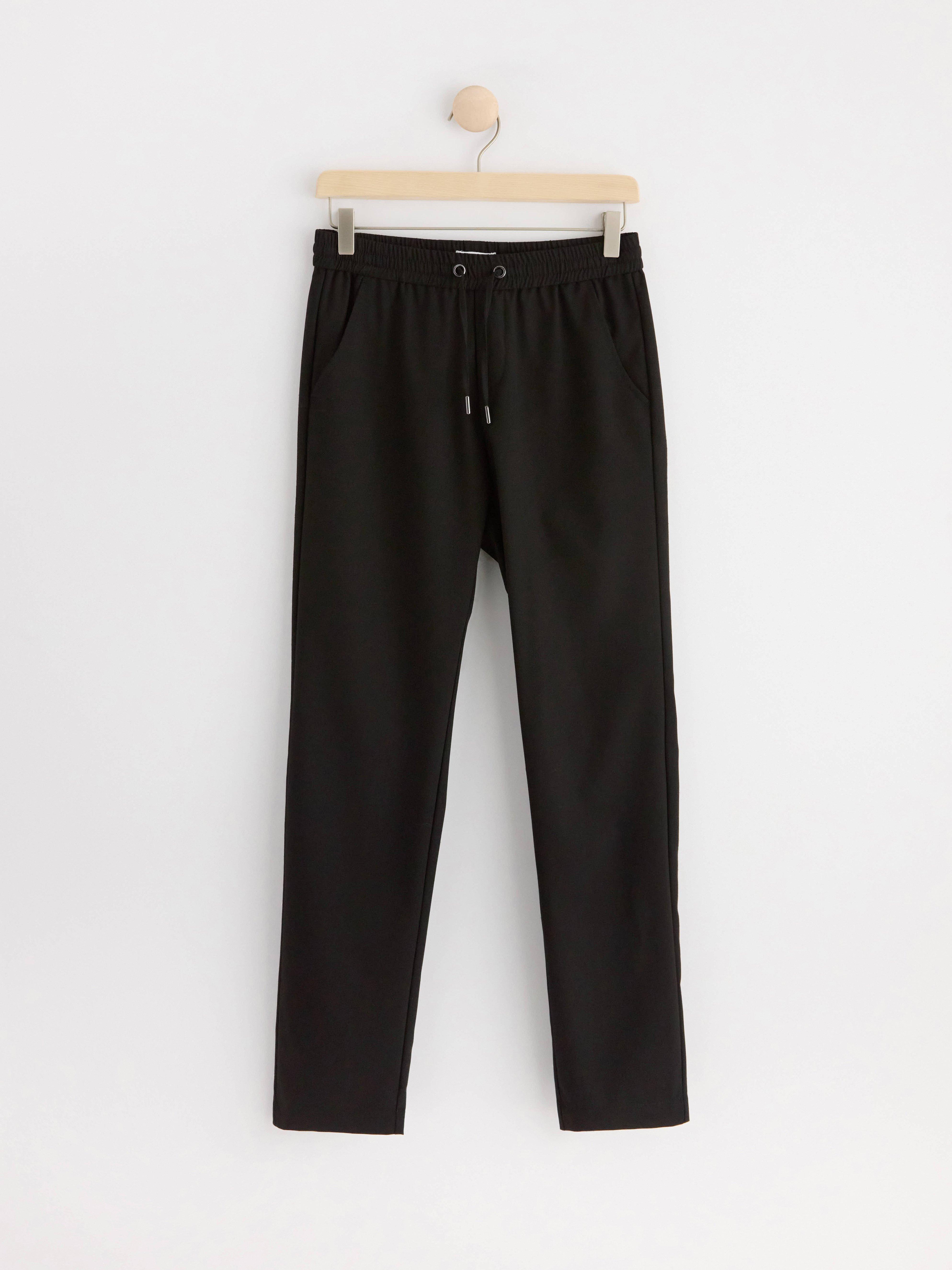 STAFFAN Straight regular waist trousers Black