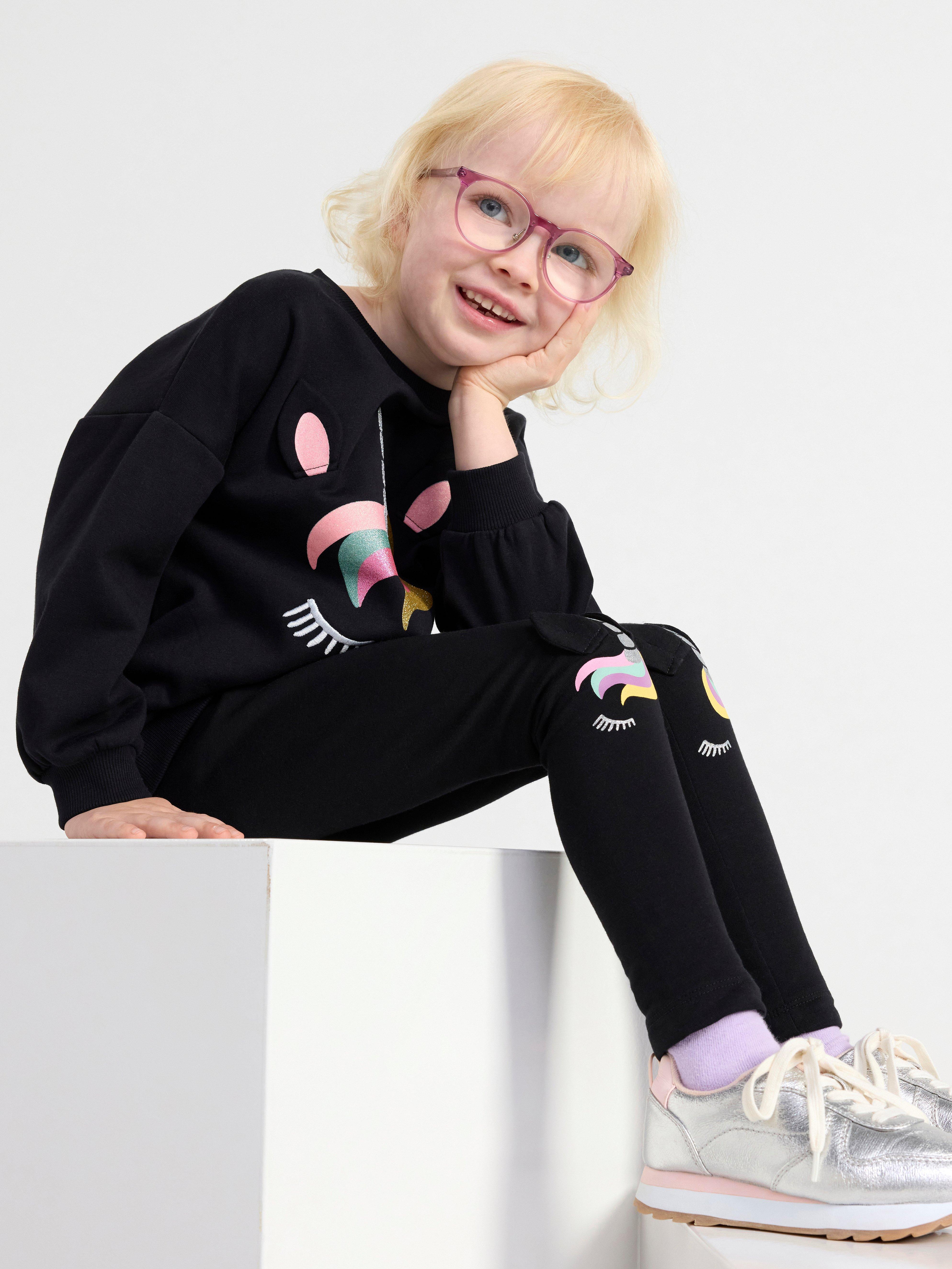 Sweatshirt with brushed inside and unicorn Black