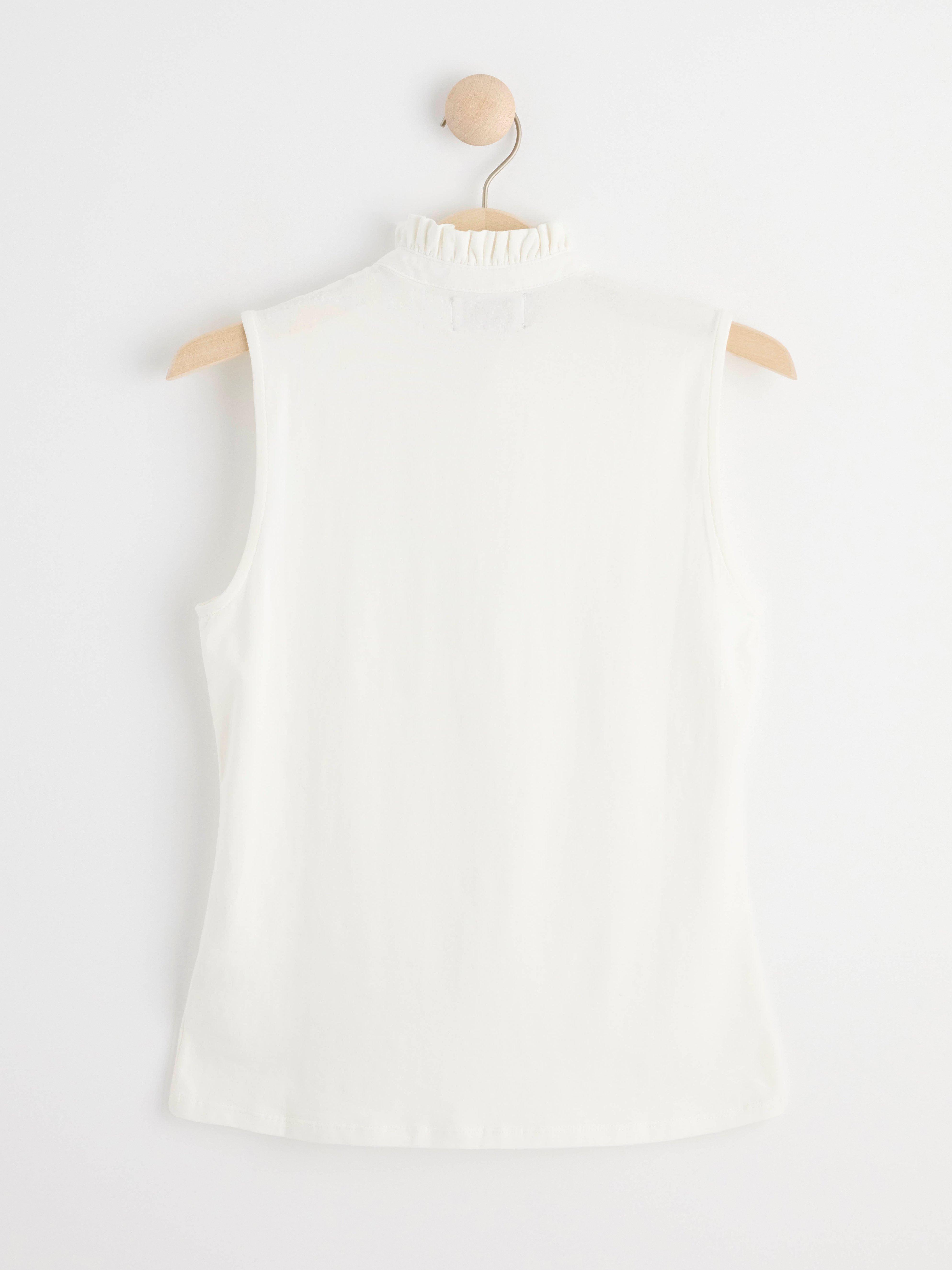 Sleeveless top with frill collar Off White