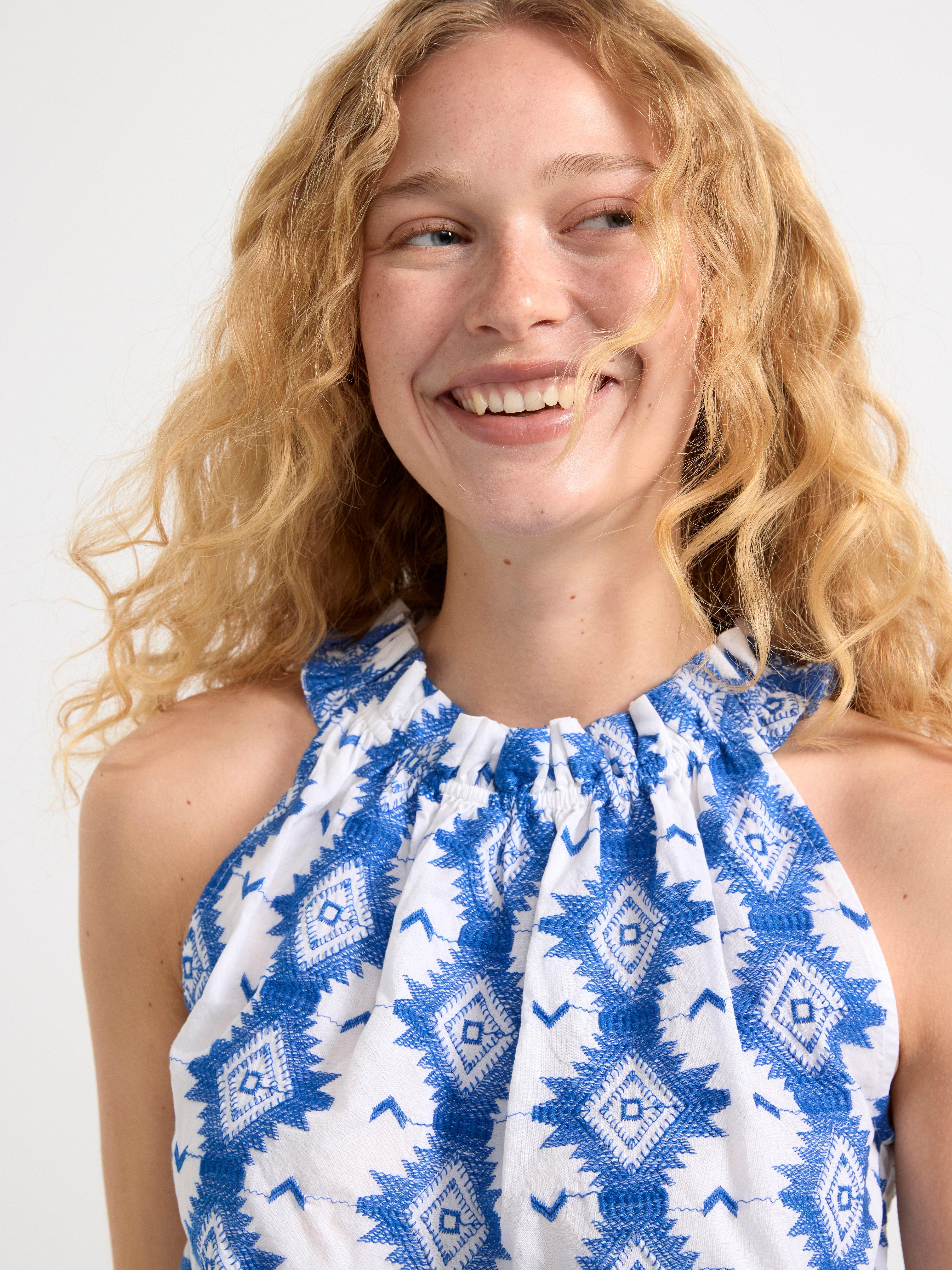 Sleeveless blouse with embroidery Off White