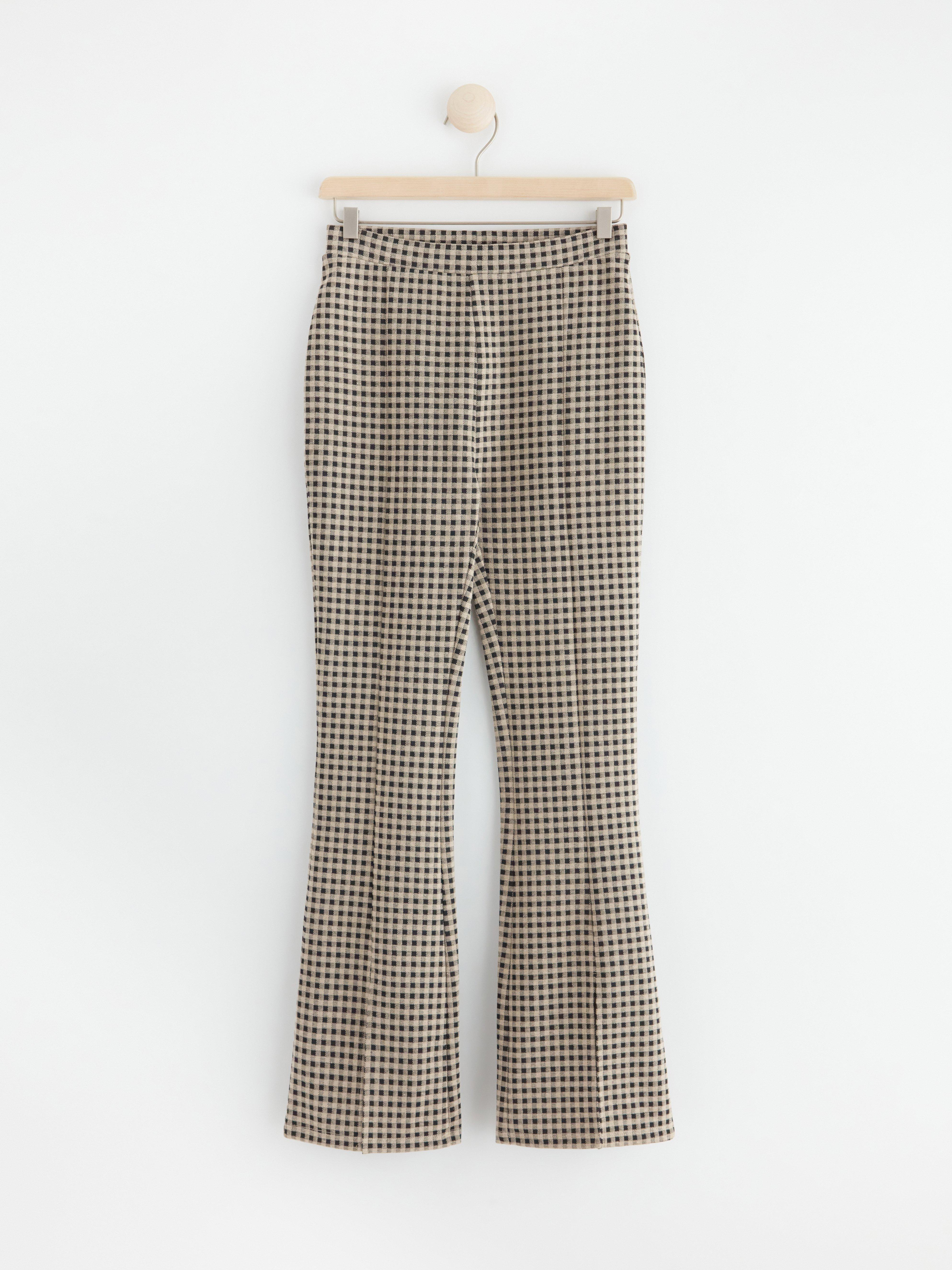 Flared trousers with checks Black