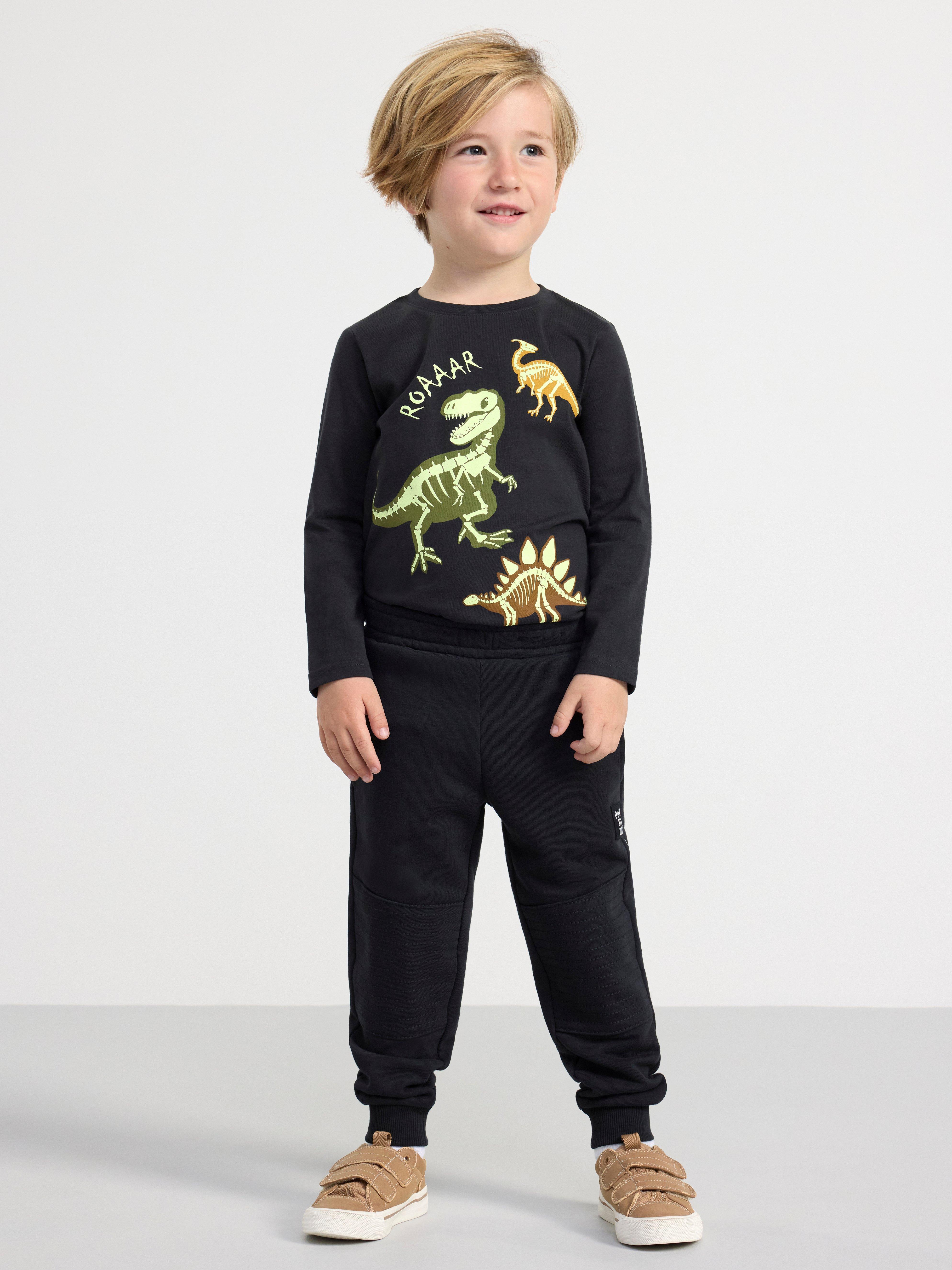 Long sleeve top with glow in the dark dinosaurs Off black