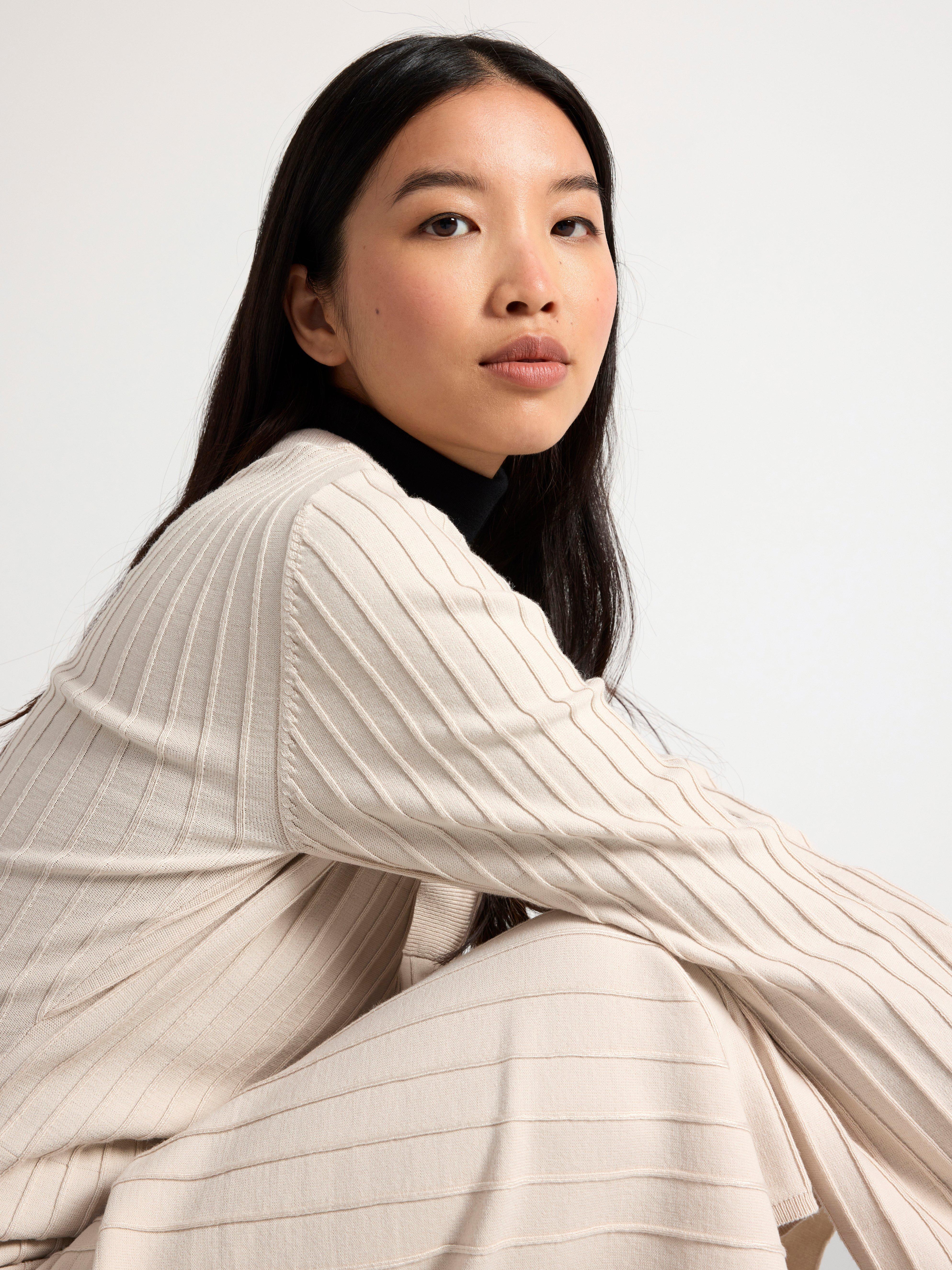 Roll neck top in merino wool Black