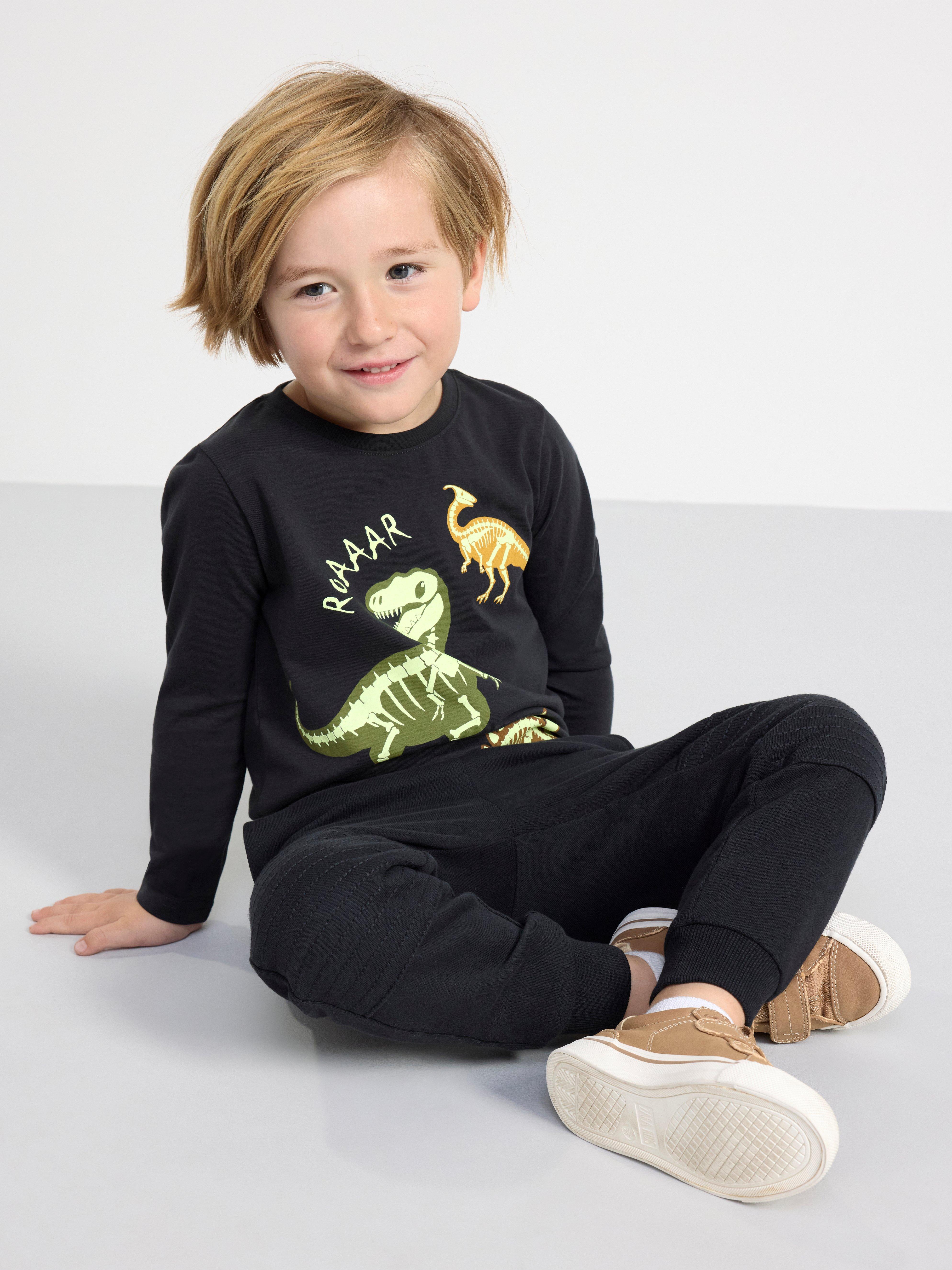 Long sleeve top with glow in the dark dinosaurs Off black
