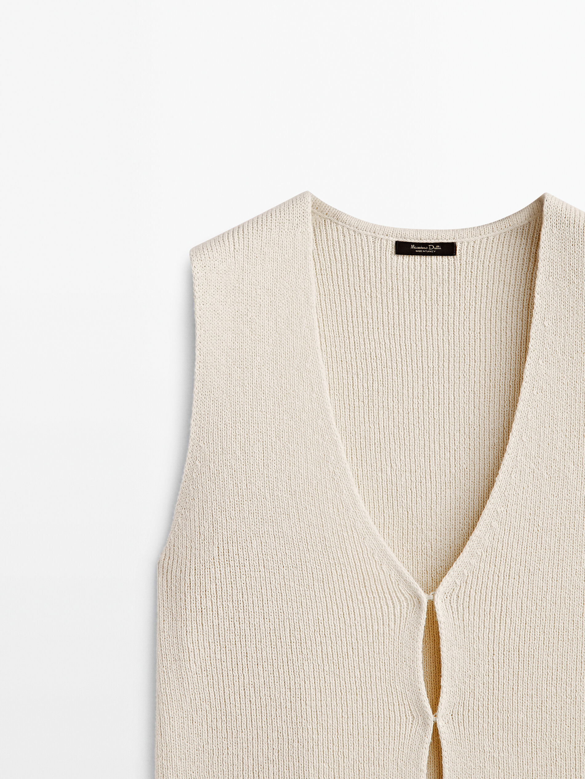 Chaleco punto cuello pico aberturas - CRUDO