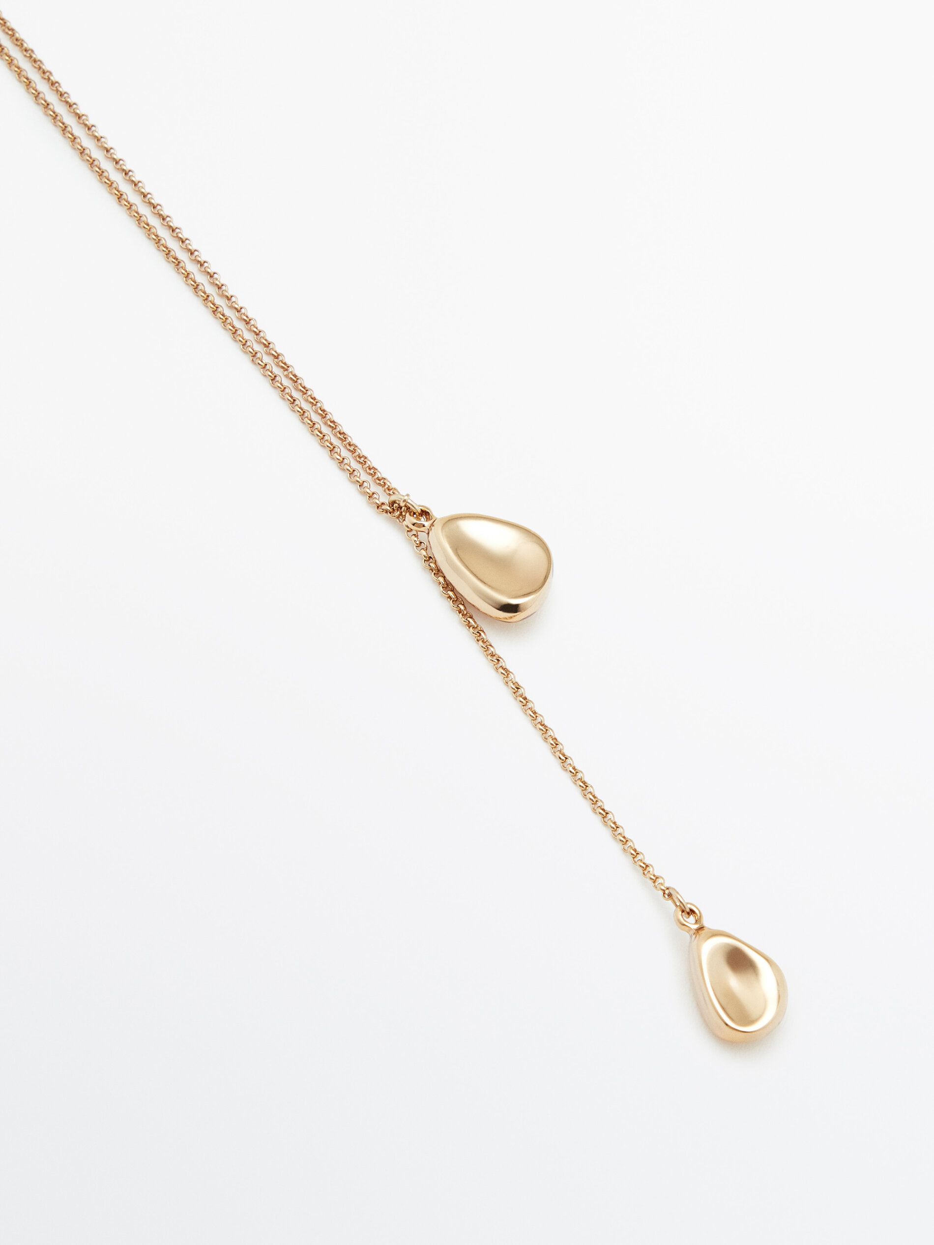 Collar largo piezas ovaladas - DORADO