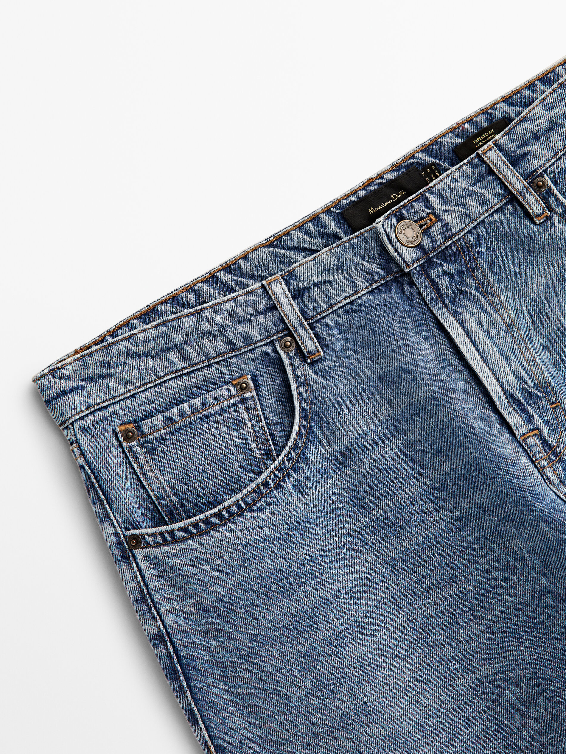 Pantalón vaquero mid stone wash tapered fit - INDIGO