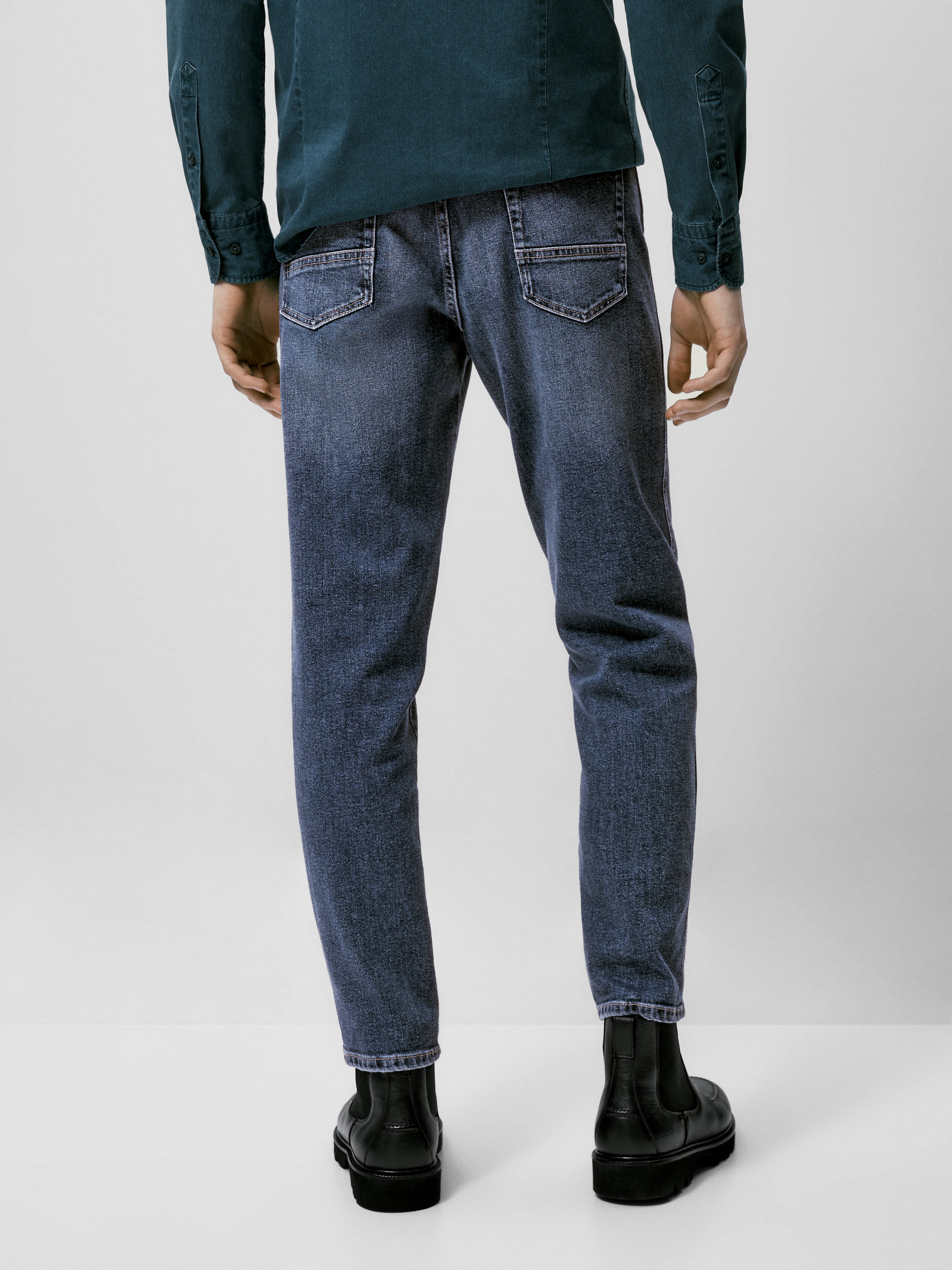 Pantalón vaquero stone wash tapered fit - INDIGO