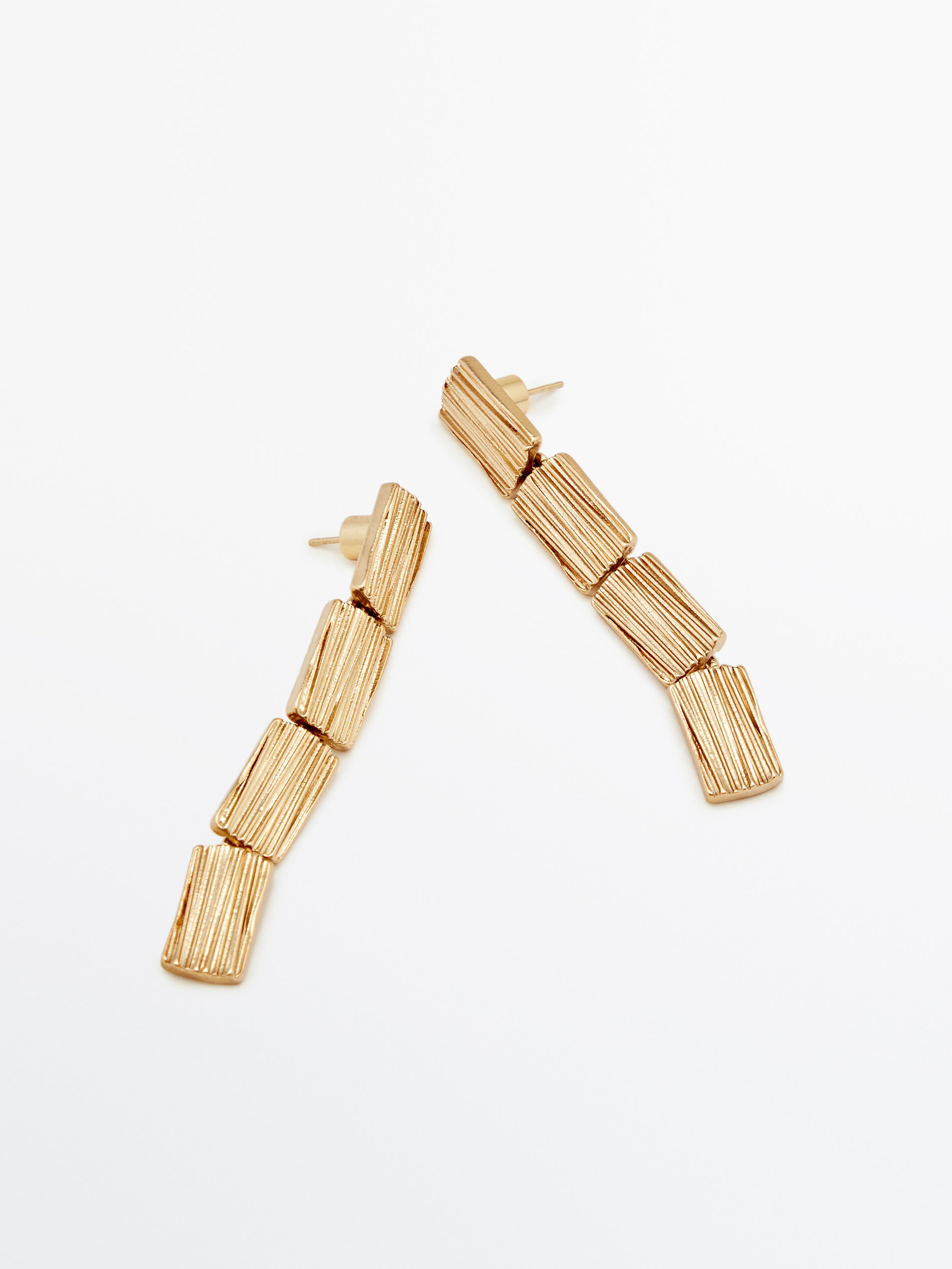 Pendientes largos textura baño oro - DORADO