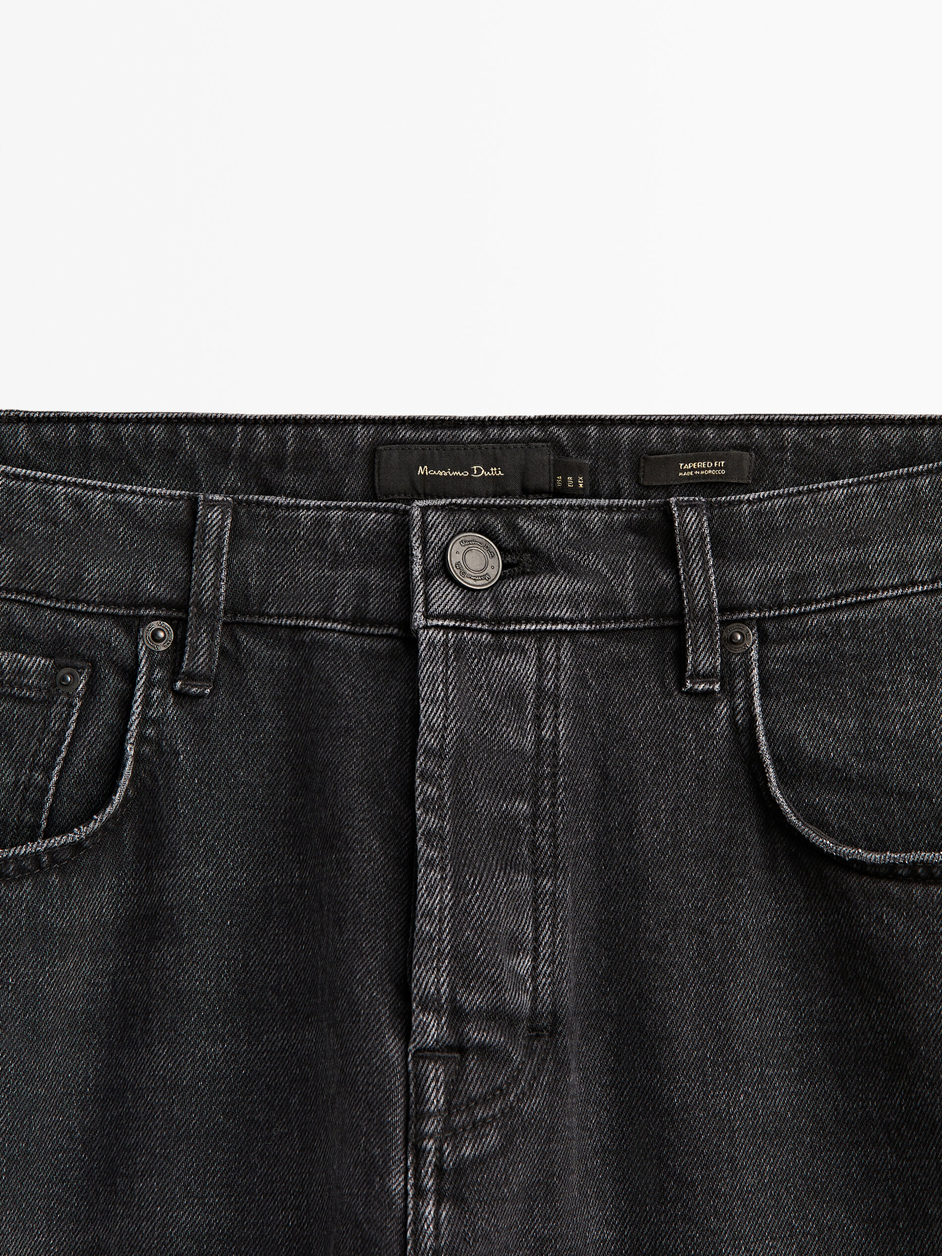 Pantalón vaquero stone wash tapered fit - GRIS