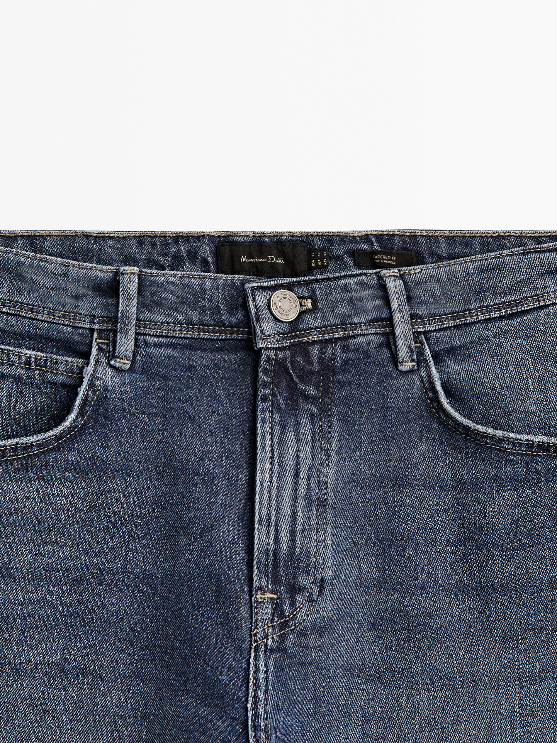 Pantalón vaquero stone wash tapered fit - INDIGO