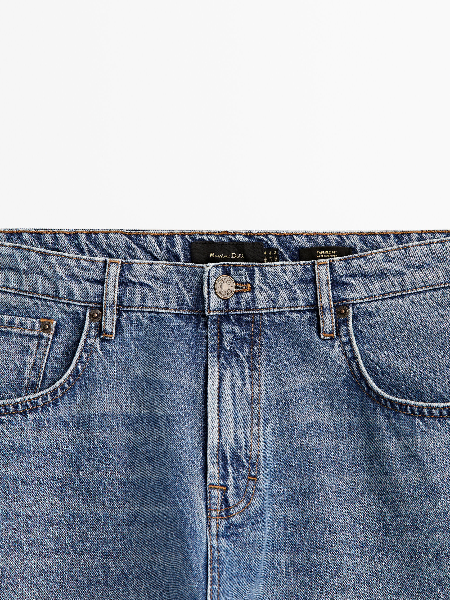 Pantalón vaquero mid stone wash tapered fit - INDIGO