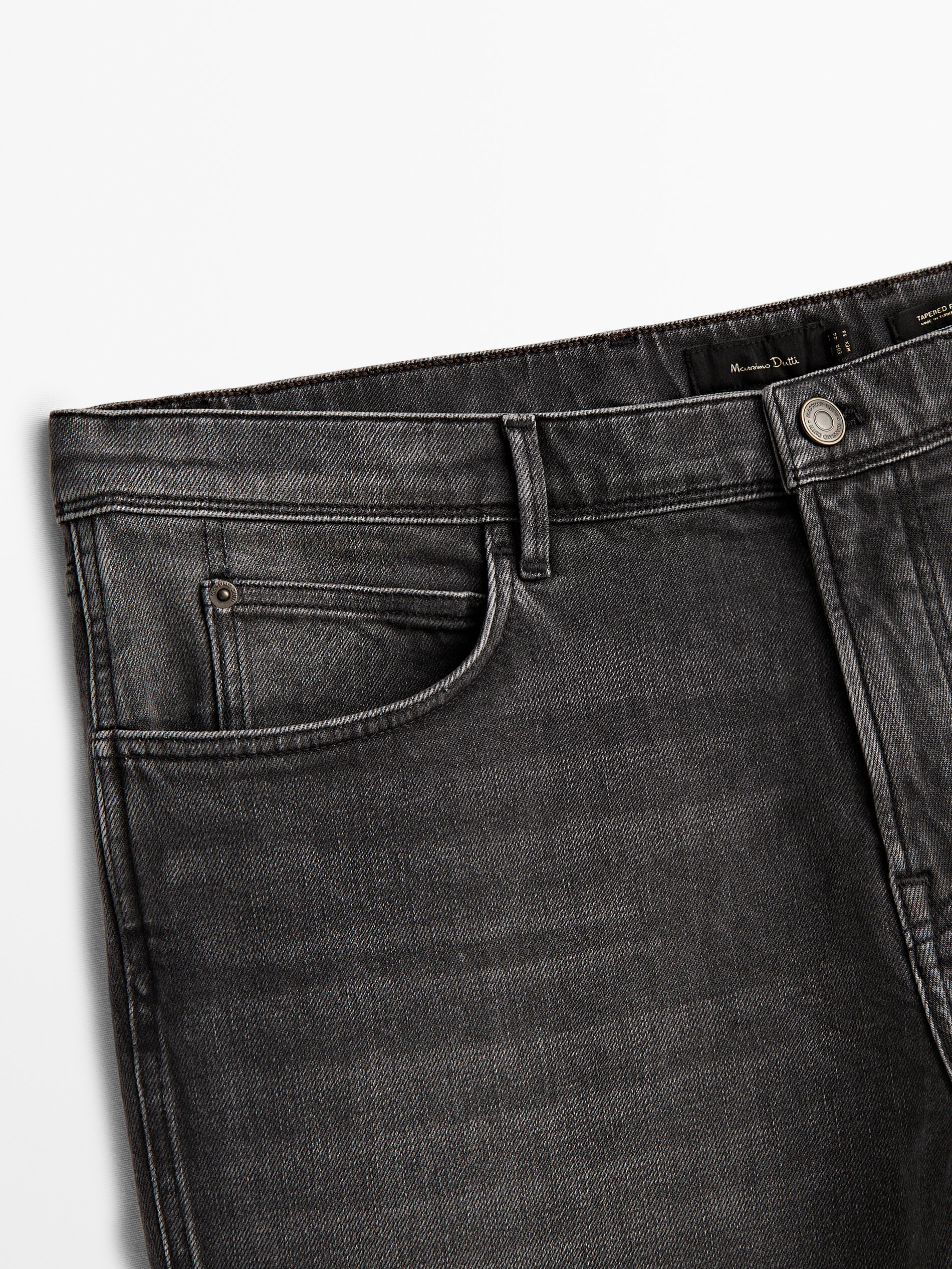 Pantalón vaquero stone wash tapered fit - GRIS