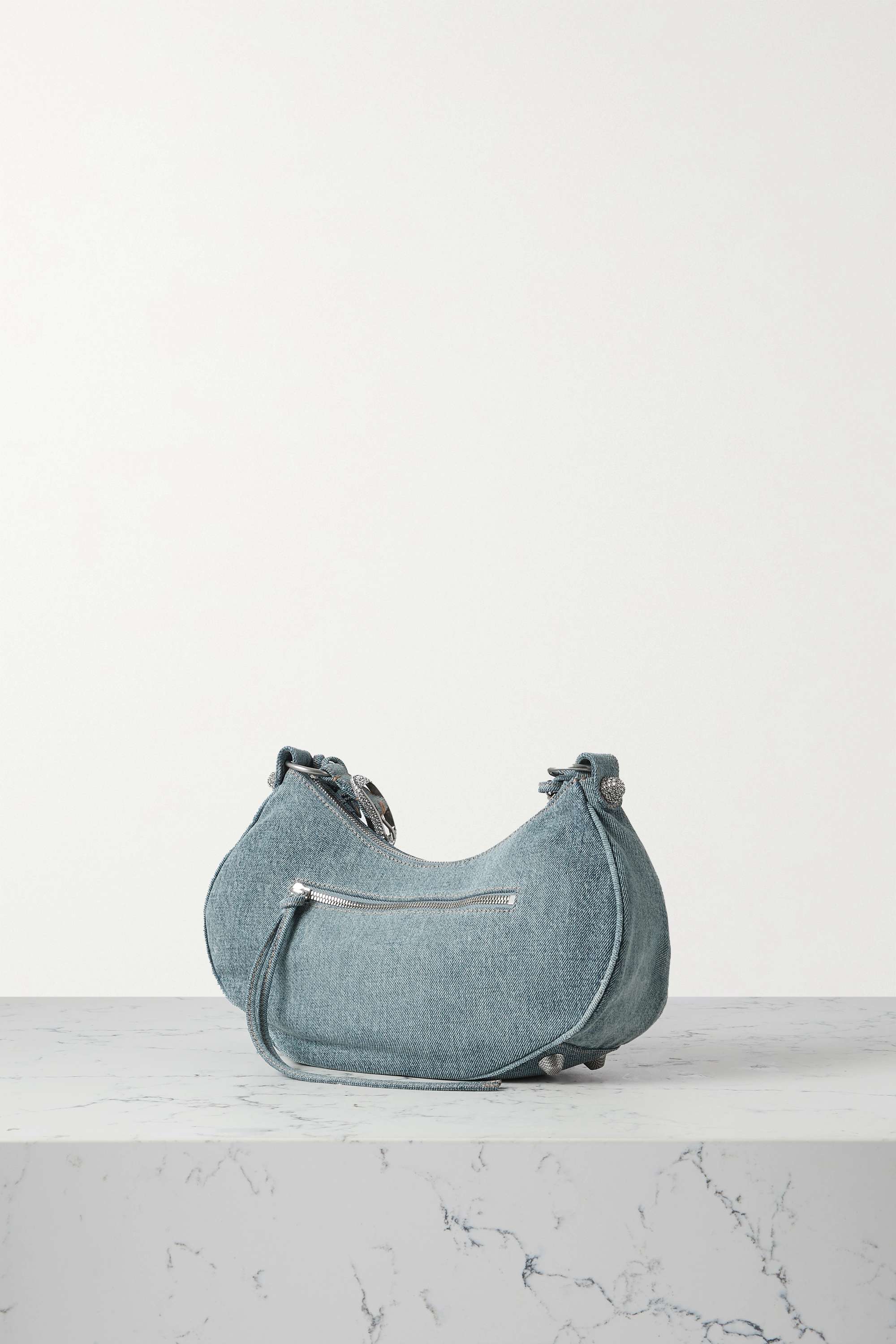 BALENCIAGA Le Cagole small embellished denim shoulder bag