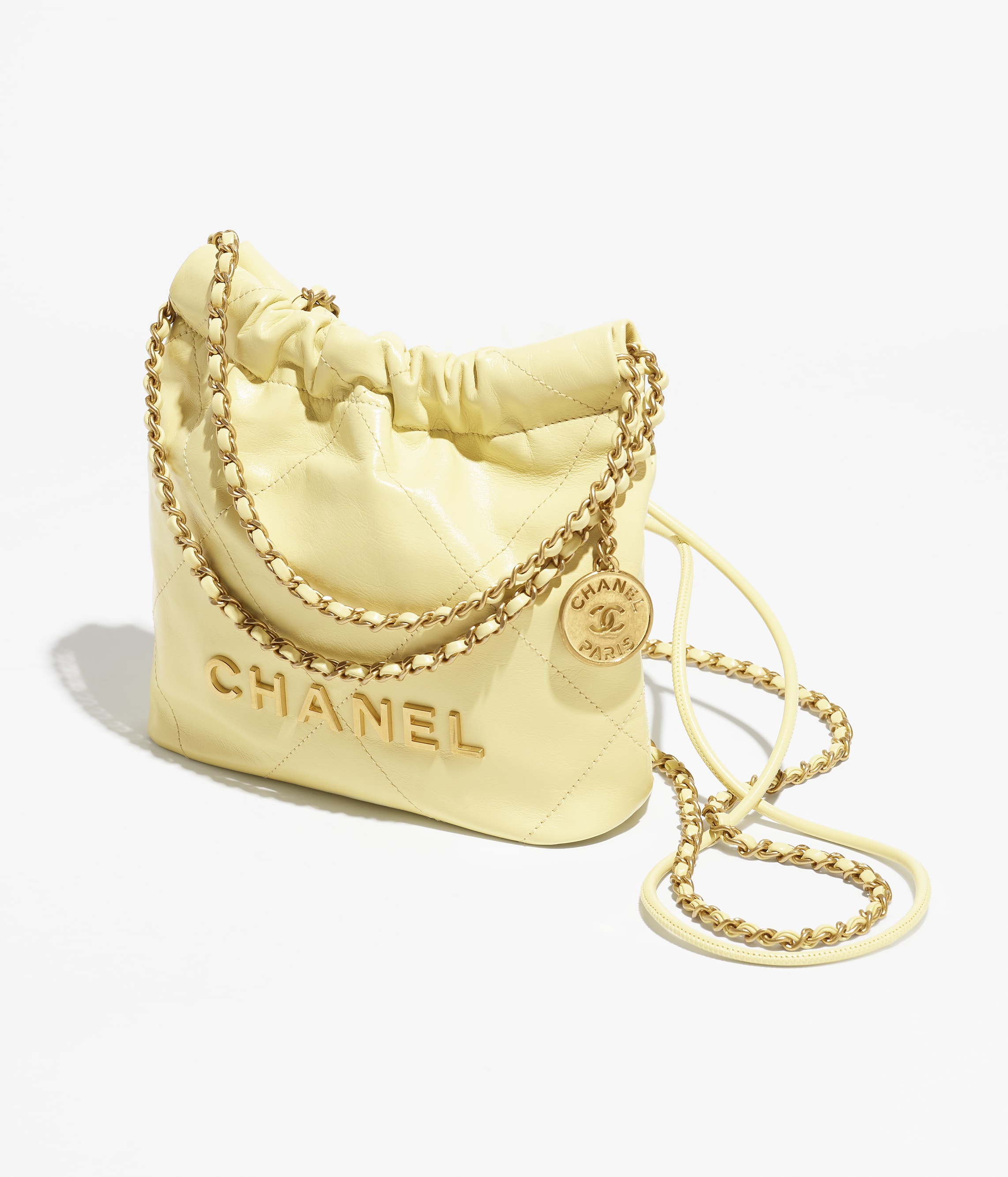 CHANEL 22 MINI HANDBAG Shiny Calfskin & Gold-Tone Metal Light Yellow