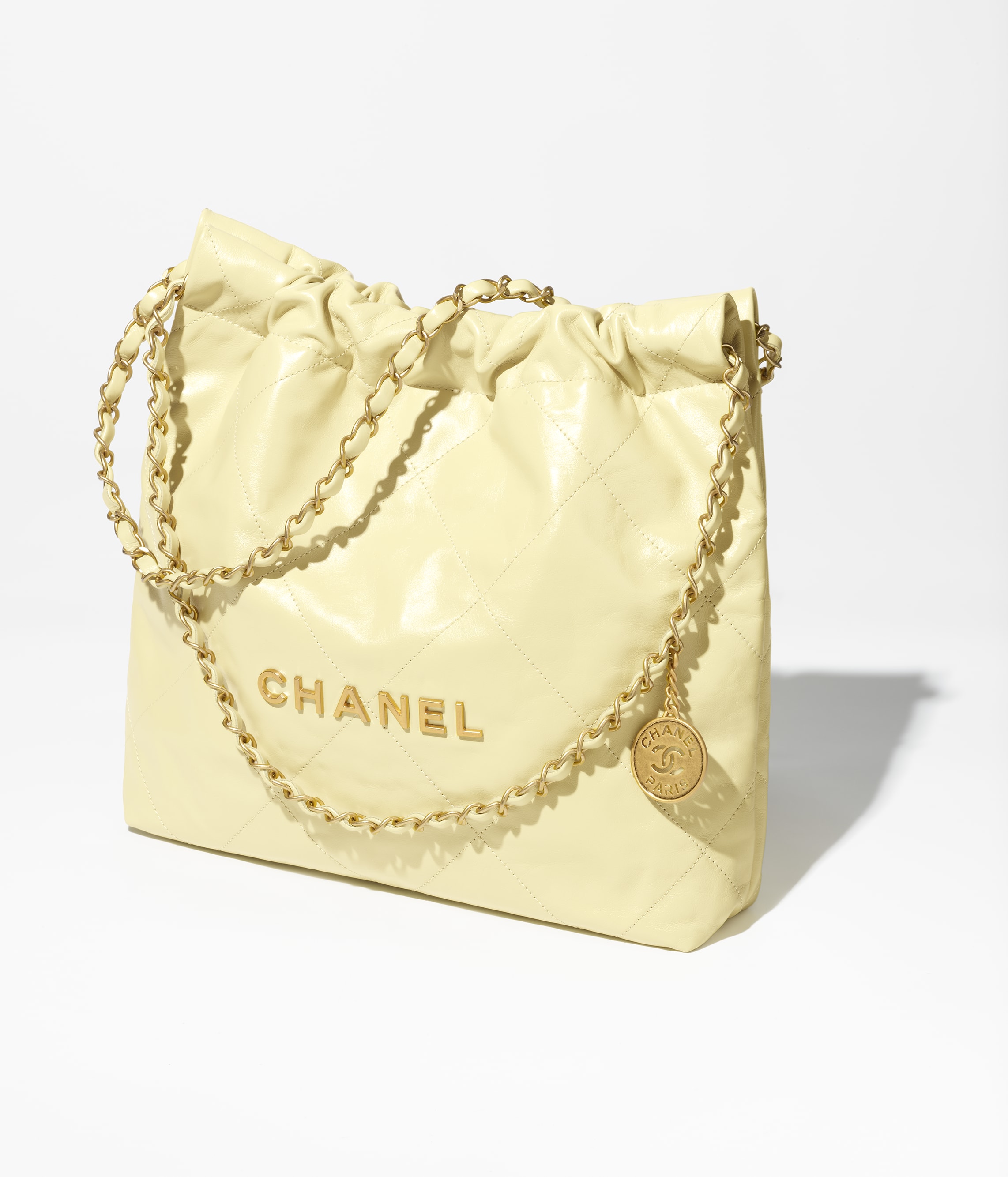 CHANEL 22 SMALL HANDBAG Calfskin & Silver Metal Yellow