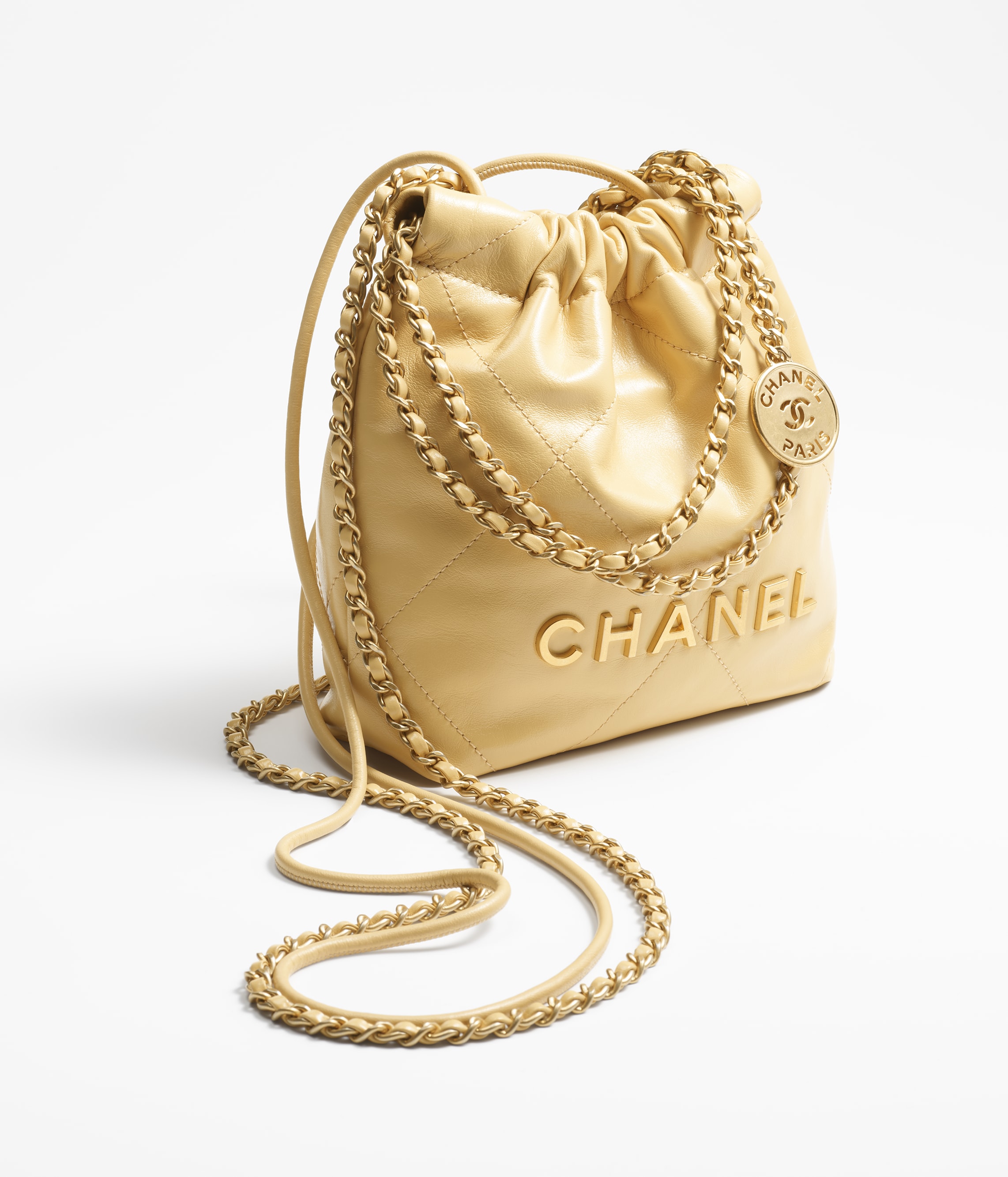CHANEL 22 MINI HANDBAG Shiny Calfskin & Gold-Tone Metal Yellow