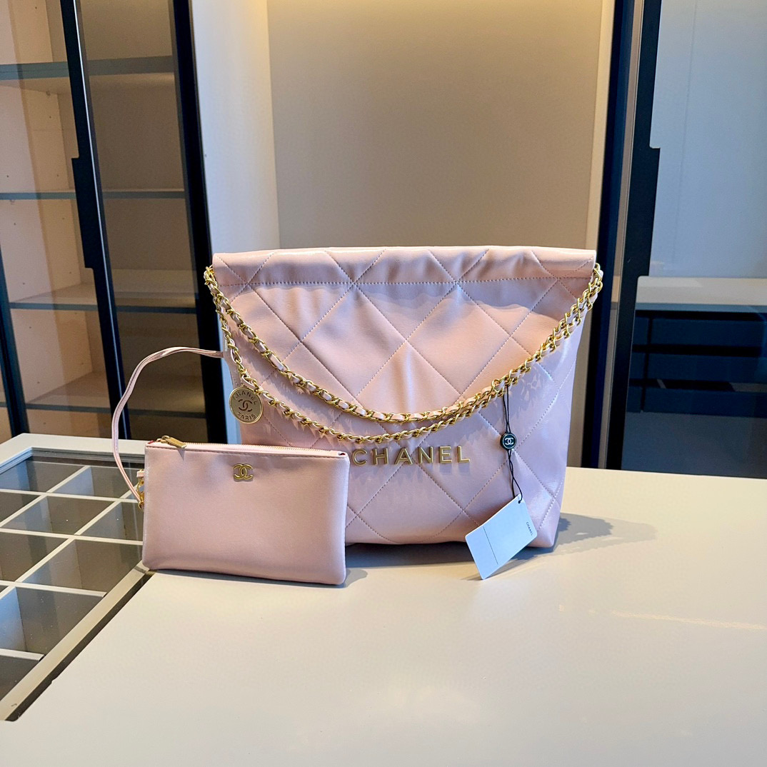 CHANEL 22 SMALL HANDBAG Calfskin & Gold Metal Pink