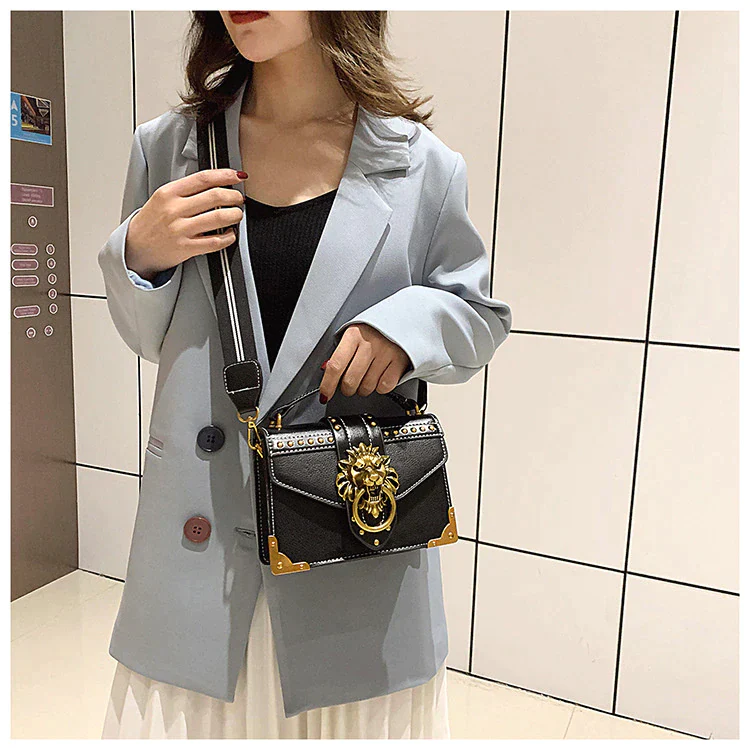 Ladies crossbody bag lion head metal detail