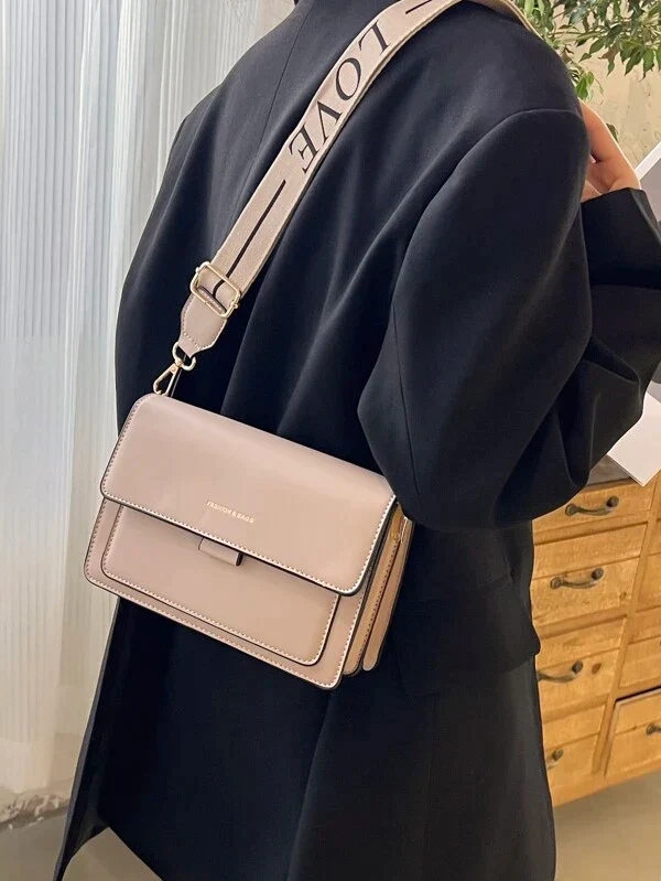 Ladies graphic flap messenger bag