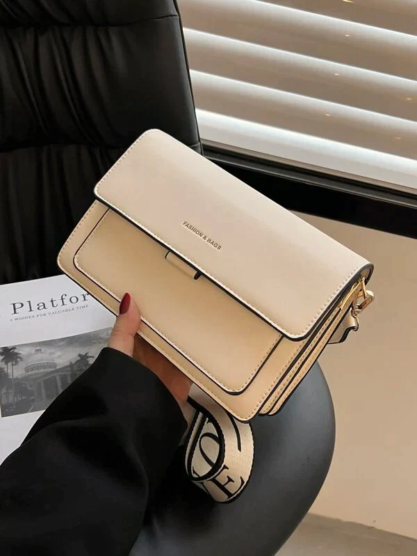 Ladies graphic flap messenger bag