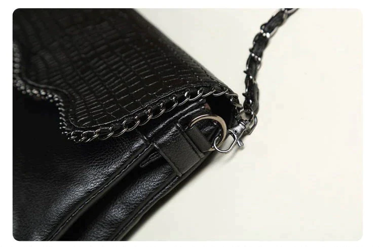 Stylish clutch and crossbody bag with chain detail available in sml & lrge