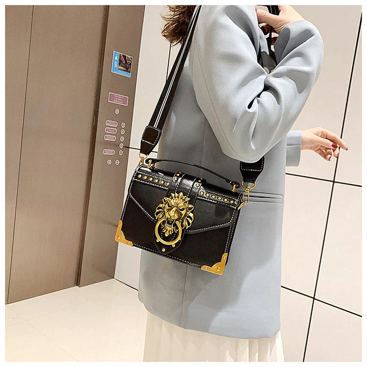 Ladies crossbody bag lion head metal detail