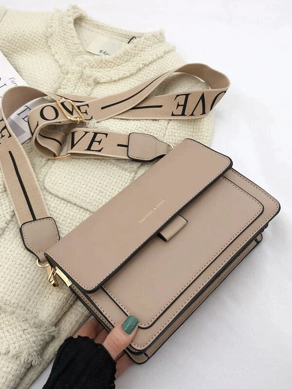 Ladies graphic flap messenger bag