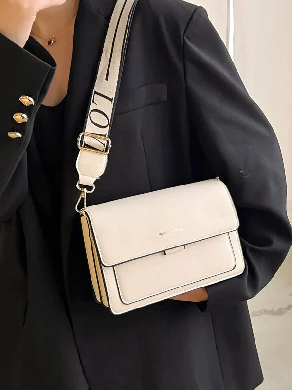 Ladies graphic flap messenger bag