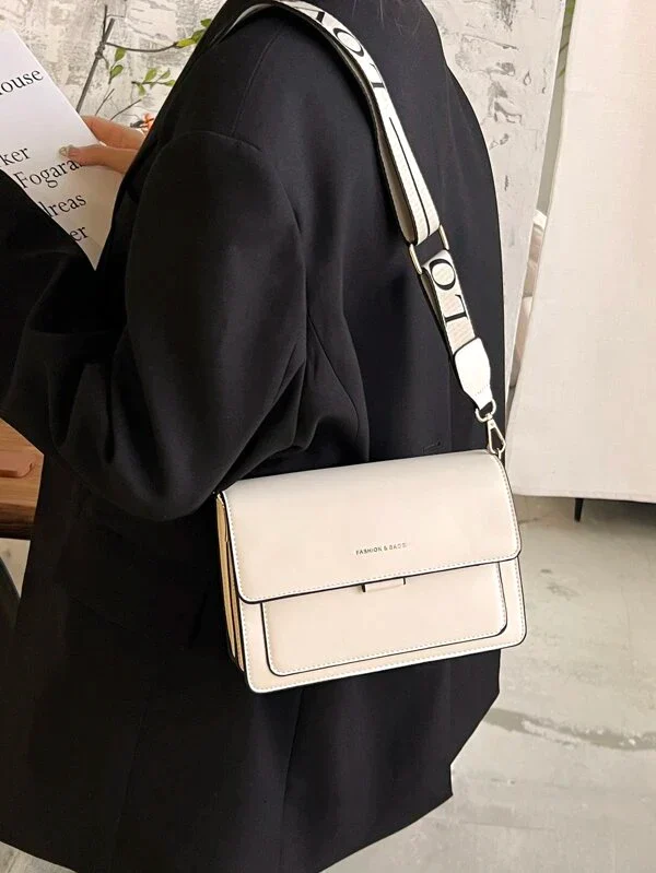 Ladies graphic flap messenger bag